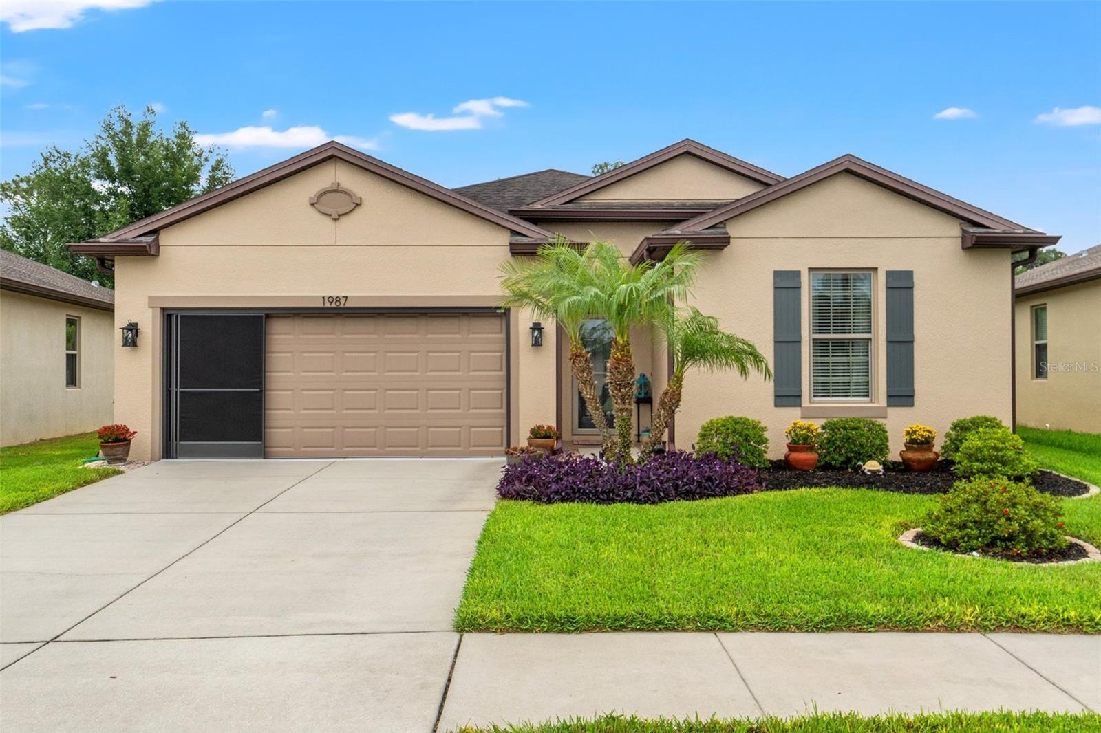 Freshly painted exterior 2 years ago and appealing landscaping as you drive up!