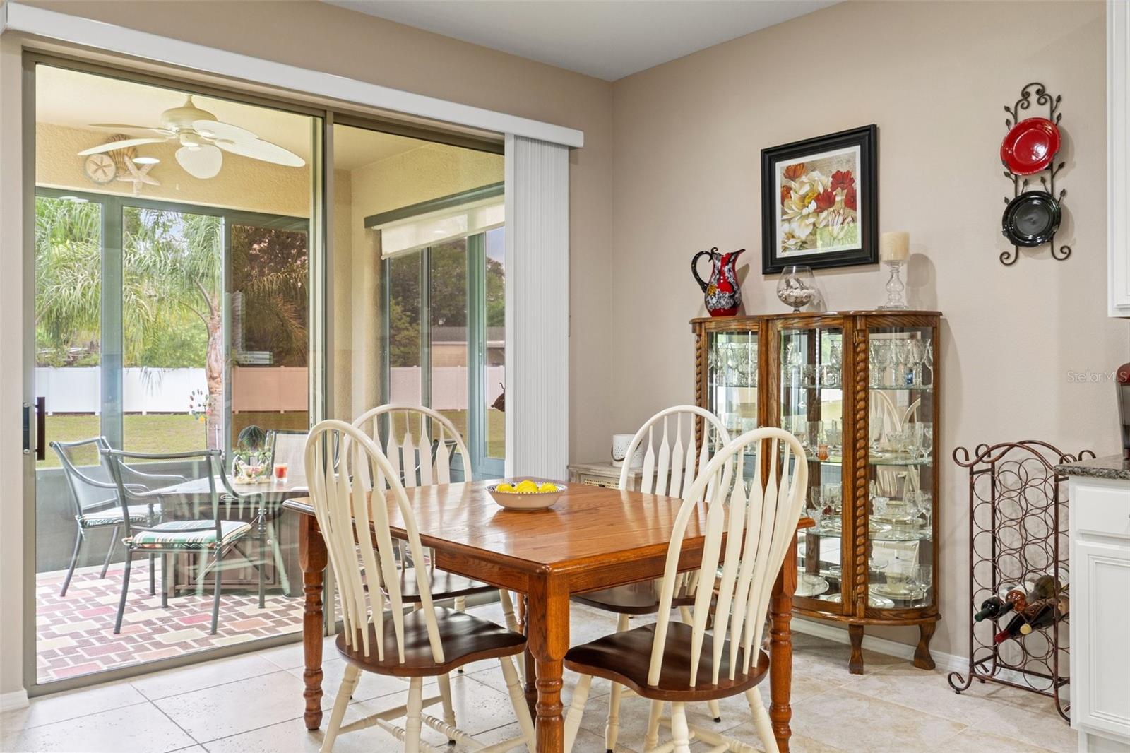The Dining Area with the slider to the Lanai. Plenty of space for a China cabinet & more.
