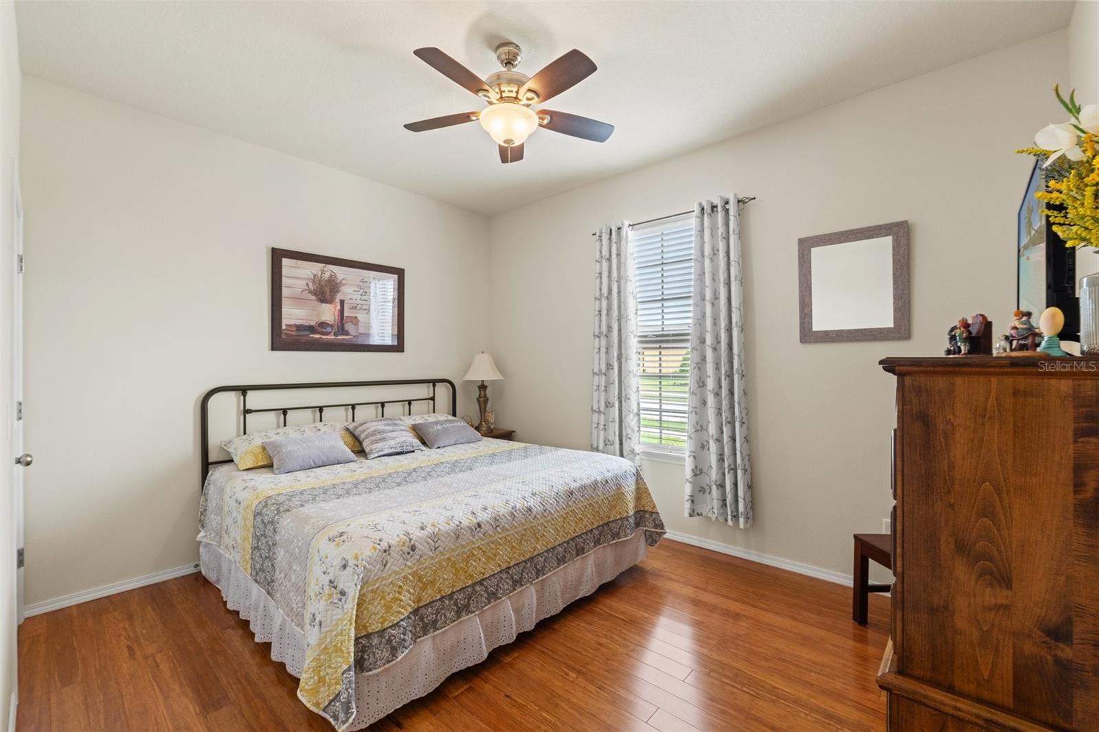 Bedroom #2 easily fits a Queen size Bedroom set and has a Walk-in Closet.