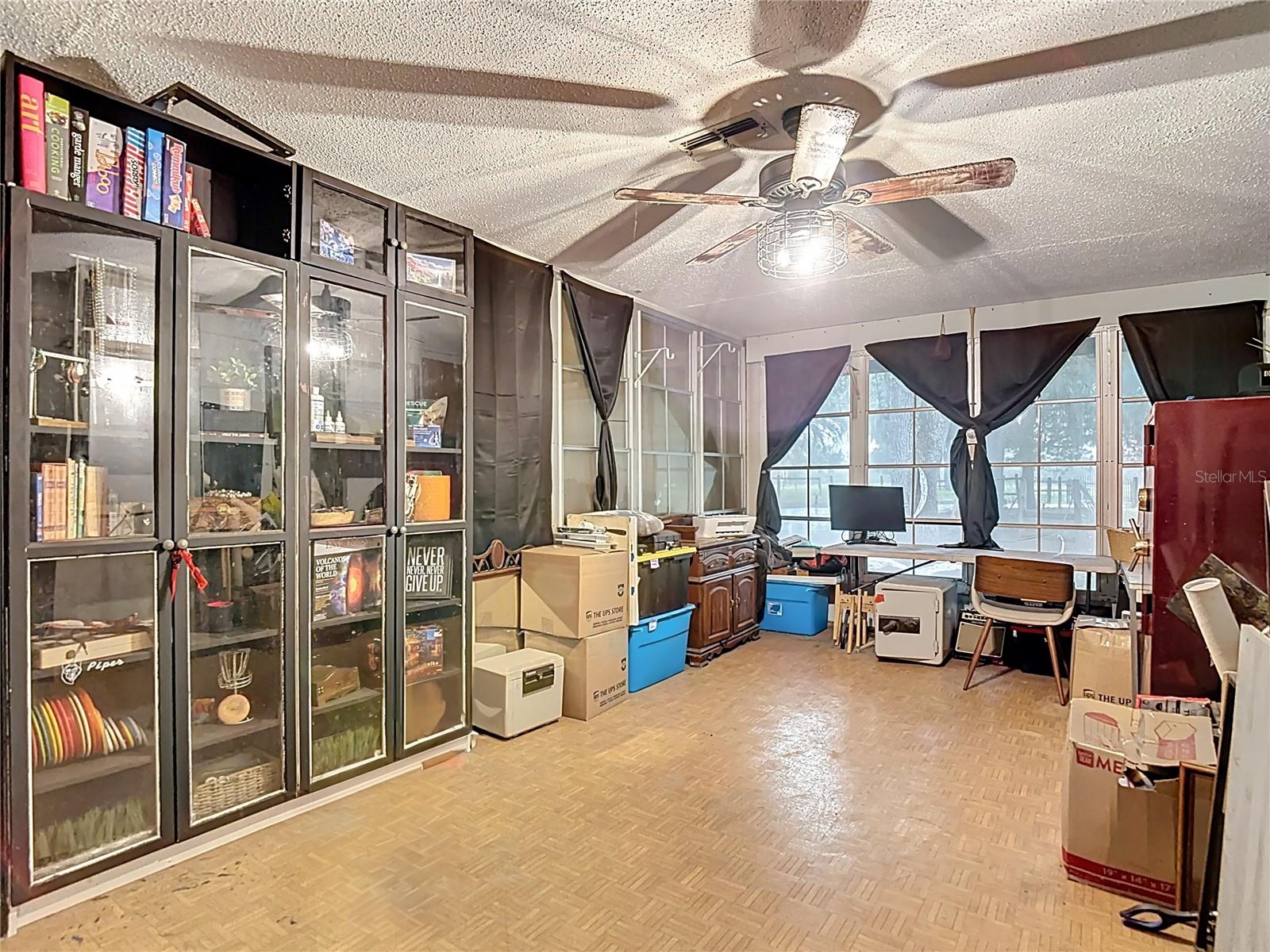 Bonus Room Hidden Behind Slate Wall in Loving Room