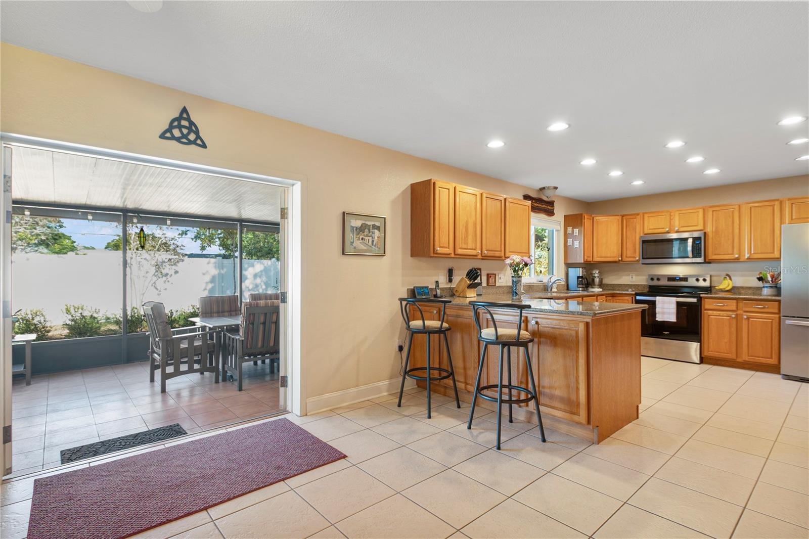 French doors open to porch