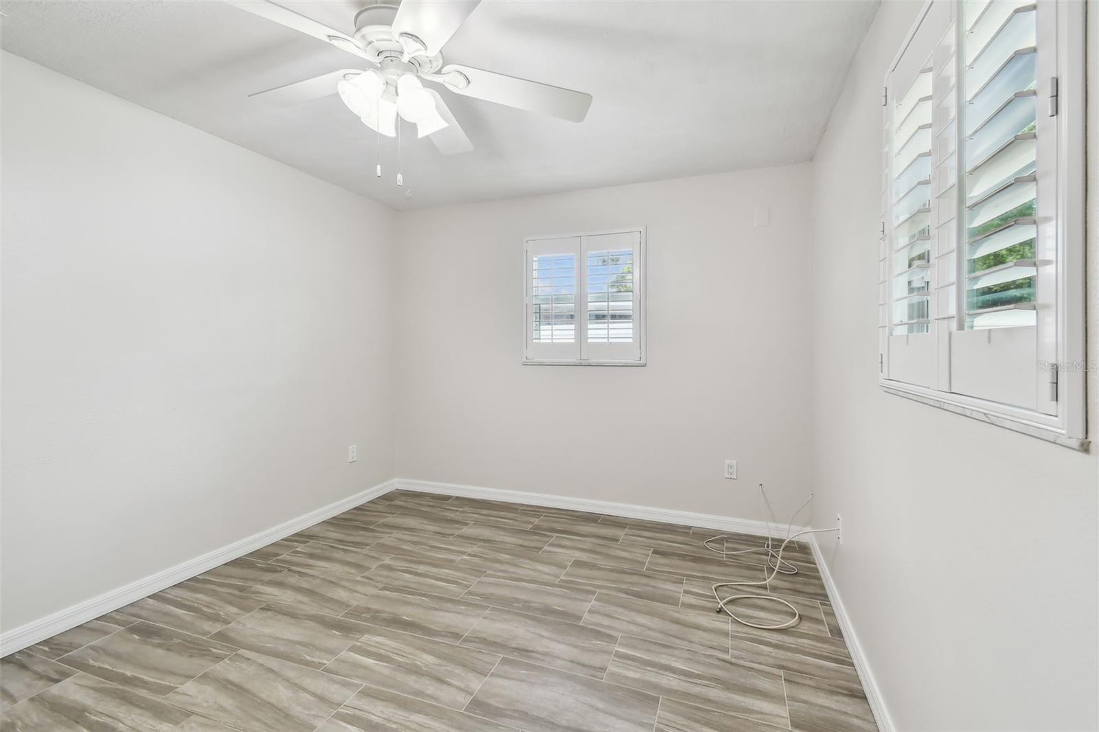 Light and bright third bedroom