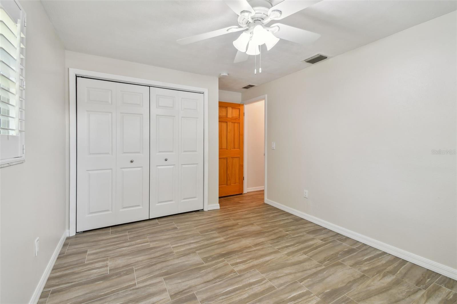 Light and bright third bedroom