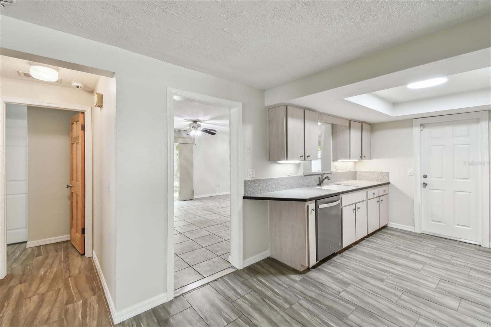 Kitchen with doorway to bonus room