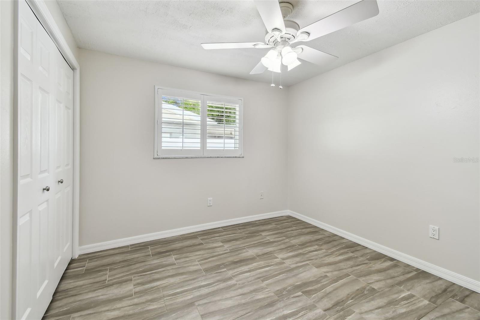 Second bedroom with shutters