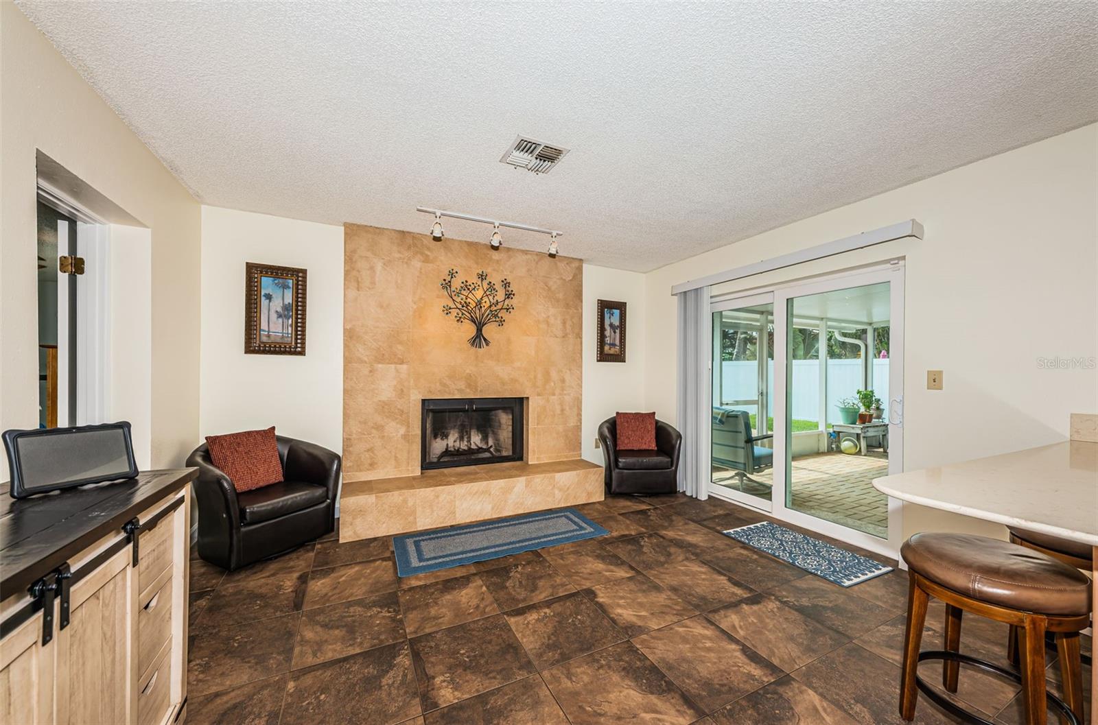 Family room with wood burning fireplace