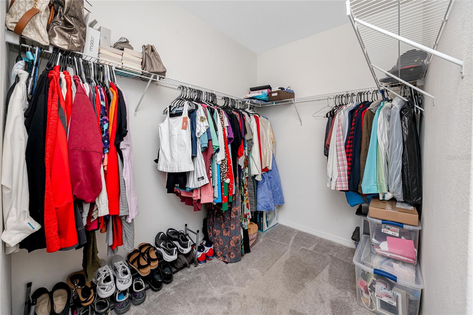 Walk in Closet in Primary bedroomr at 7034 Emerald Spring Lp, New Port Richey, FL 34653 at Copperspring