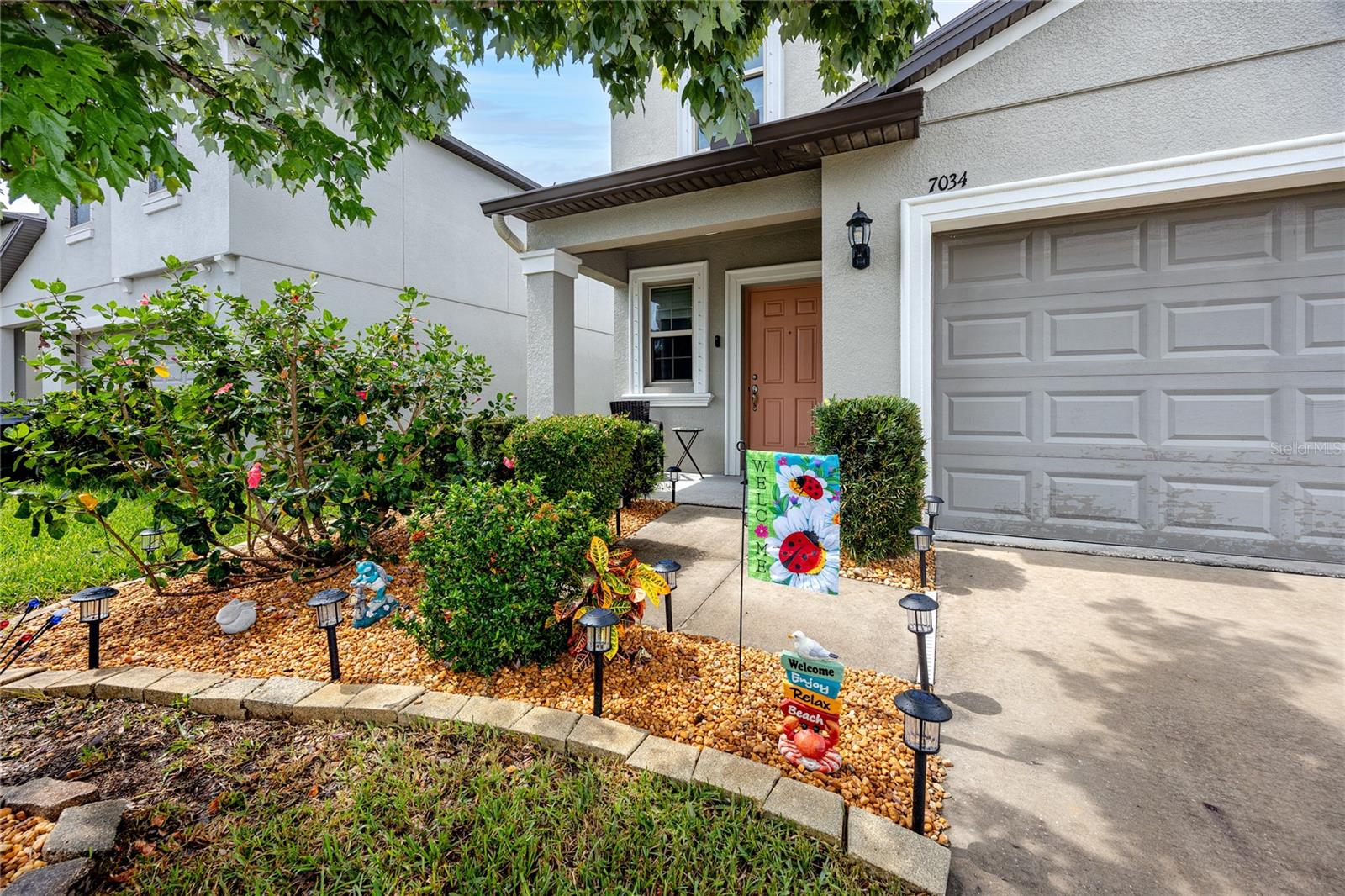 Front entry 7034 Emerald Spring Lp, New Port Richey, FL 34653 at Copperspring