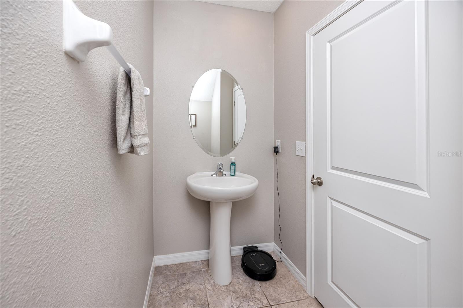 Half Bath at 7034 Emerald Spring Lp, New Port Richey, FL 34653 at Copperspring
