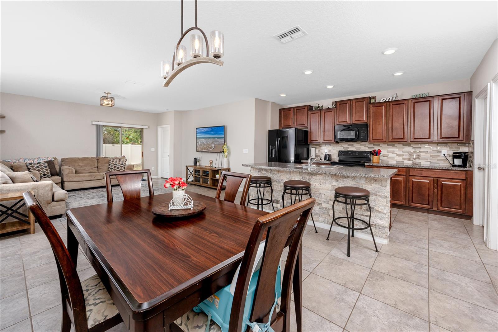 Dining area 7034 Emerald Spring Lp, New Port Richey, FL 34653 at Copperspring