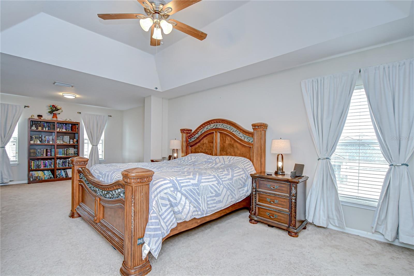 Upstairs, the primary suite includes a tray ceiling and oh so much space to relax and unwind!