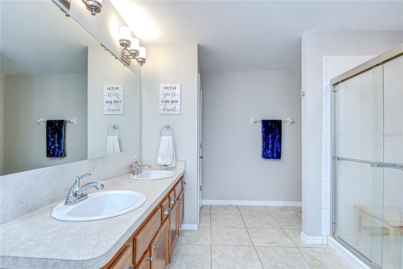The en-suite bath features dual sinks, soaking tub, and separate shower!