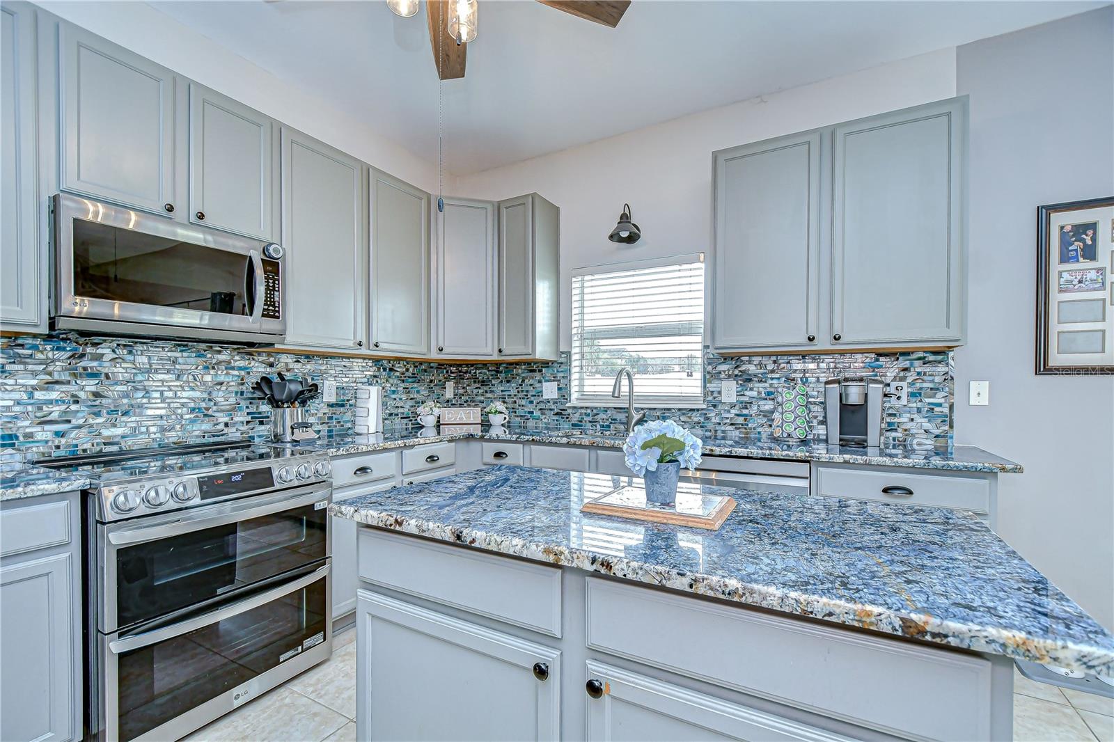 Plenty of space to prepare meals with a center island!