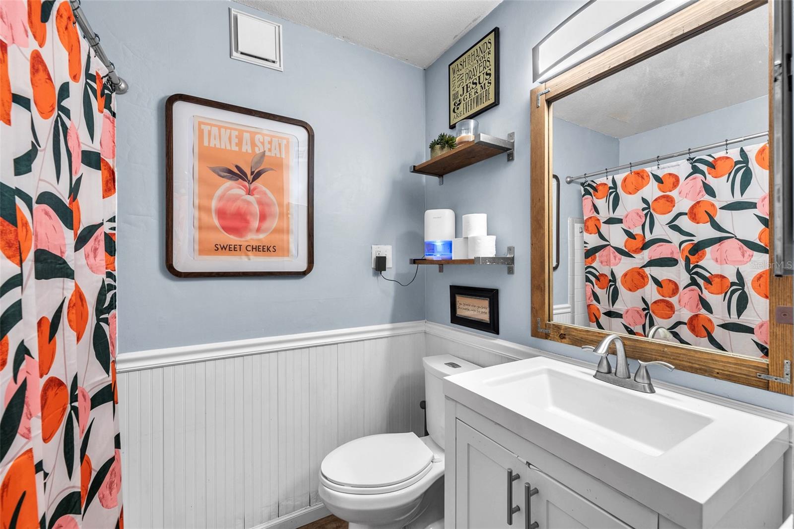Guest bathroom with tub/shower combination.