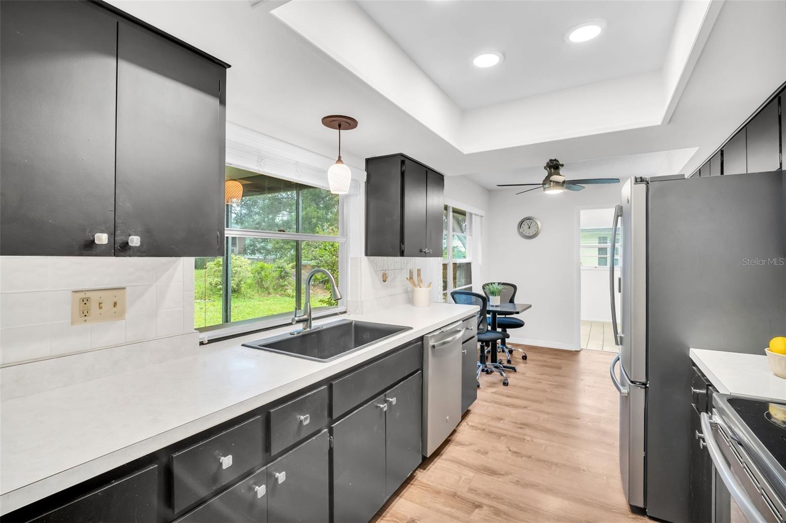 Convenient window passthrough to the private lanai making entertaining a breeze~