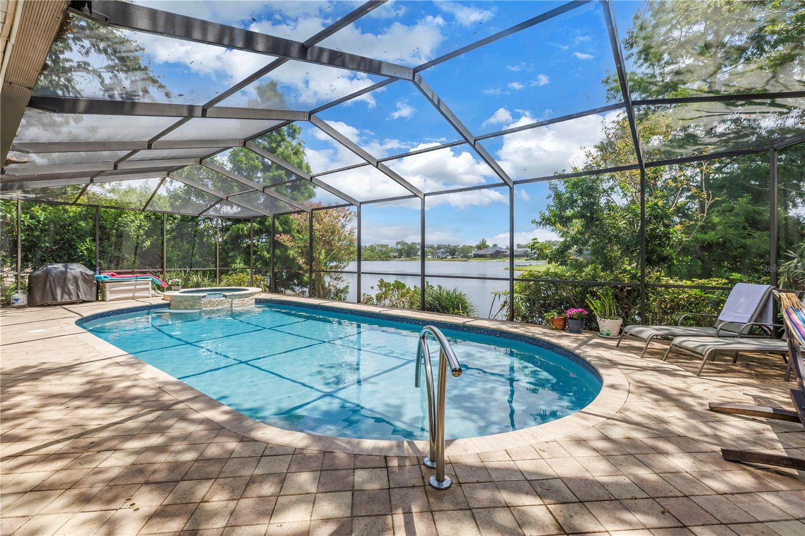 Immaculate Pool with Screened Lanai and Long View of the Lake