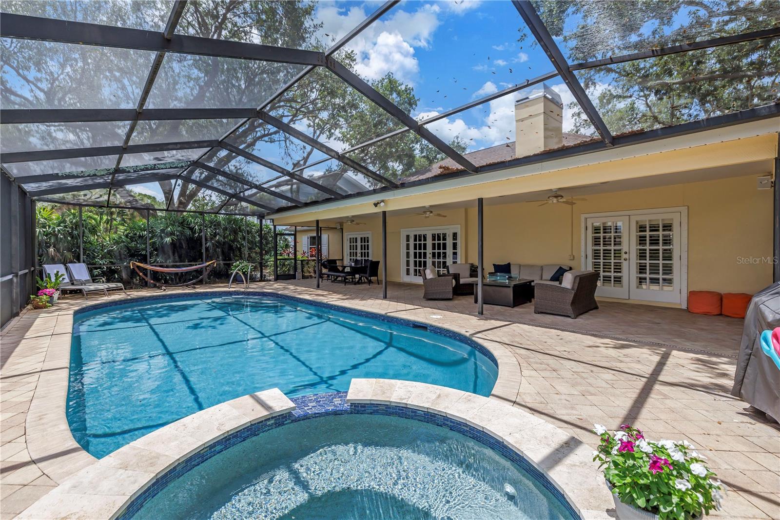 2021 Update to Pool Finish for Hot Tub and Pool.  Beautiful spillover and tile