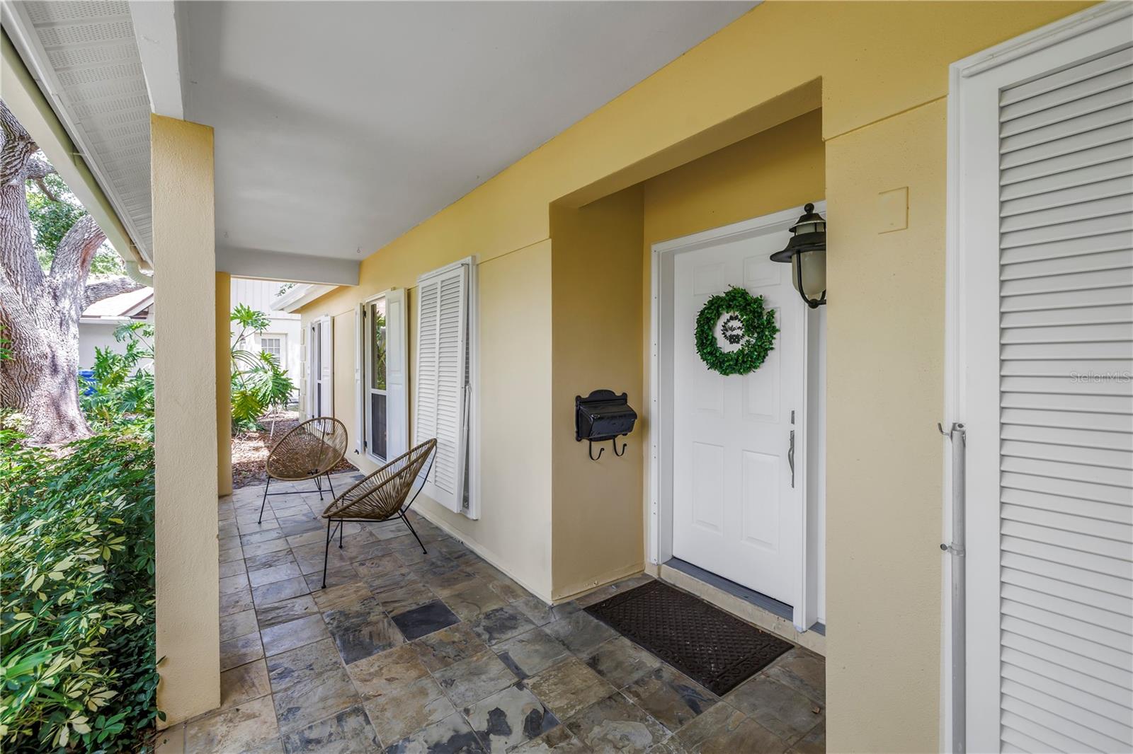 Shady and Dry Front Porch with view of Park