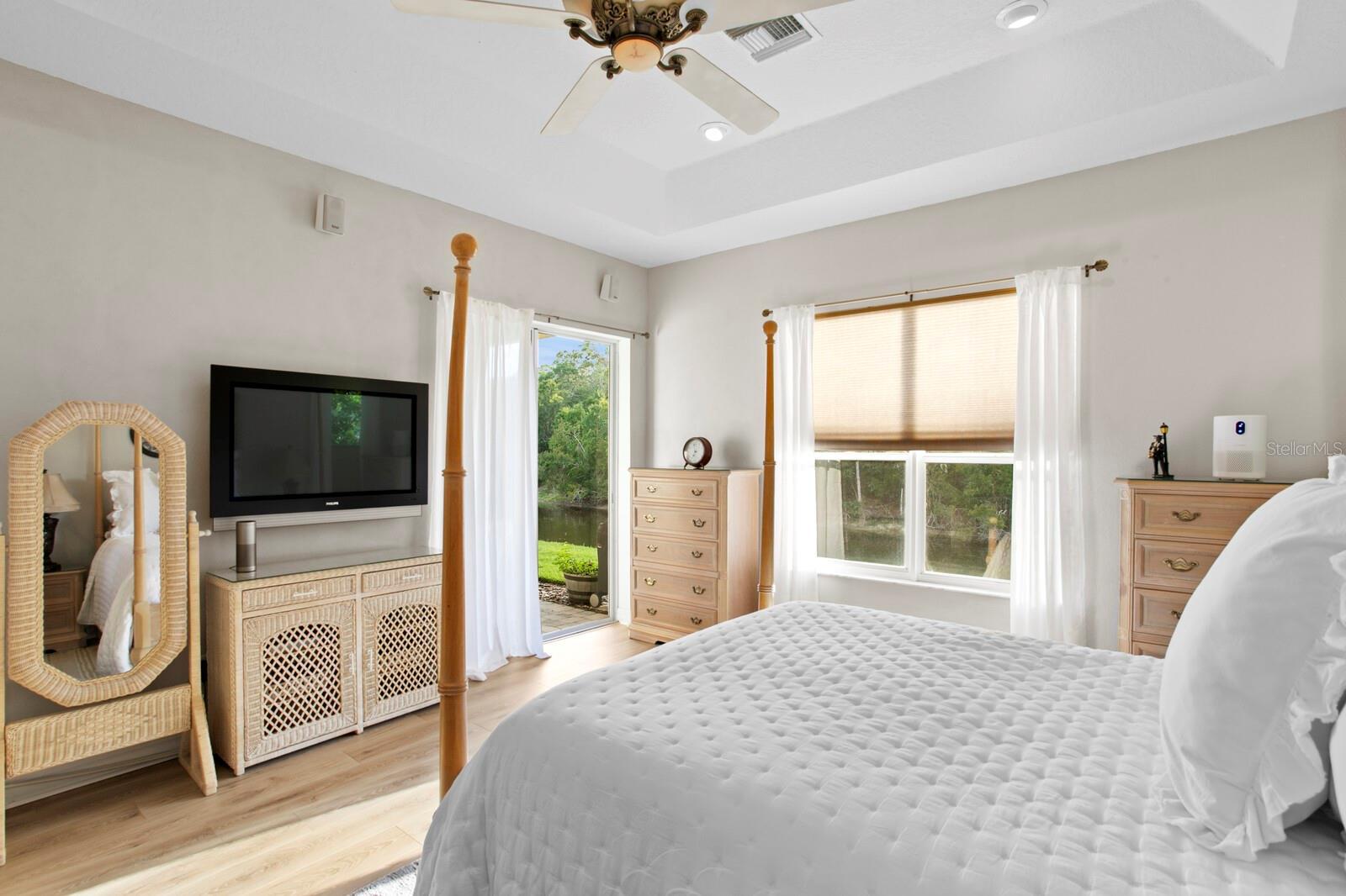 Primary bedroom looking out to the water views