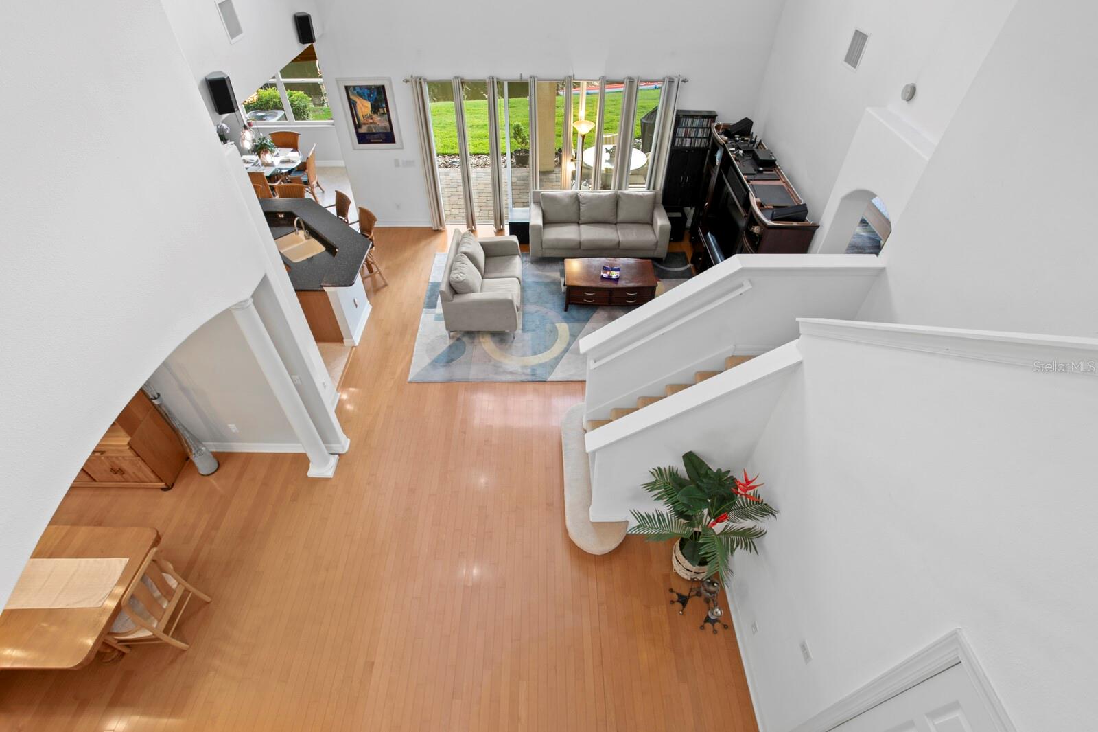 Open floor plan with soaring ceilings