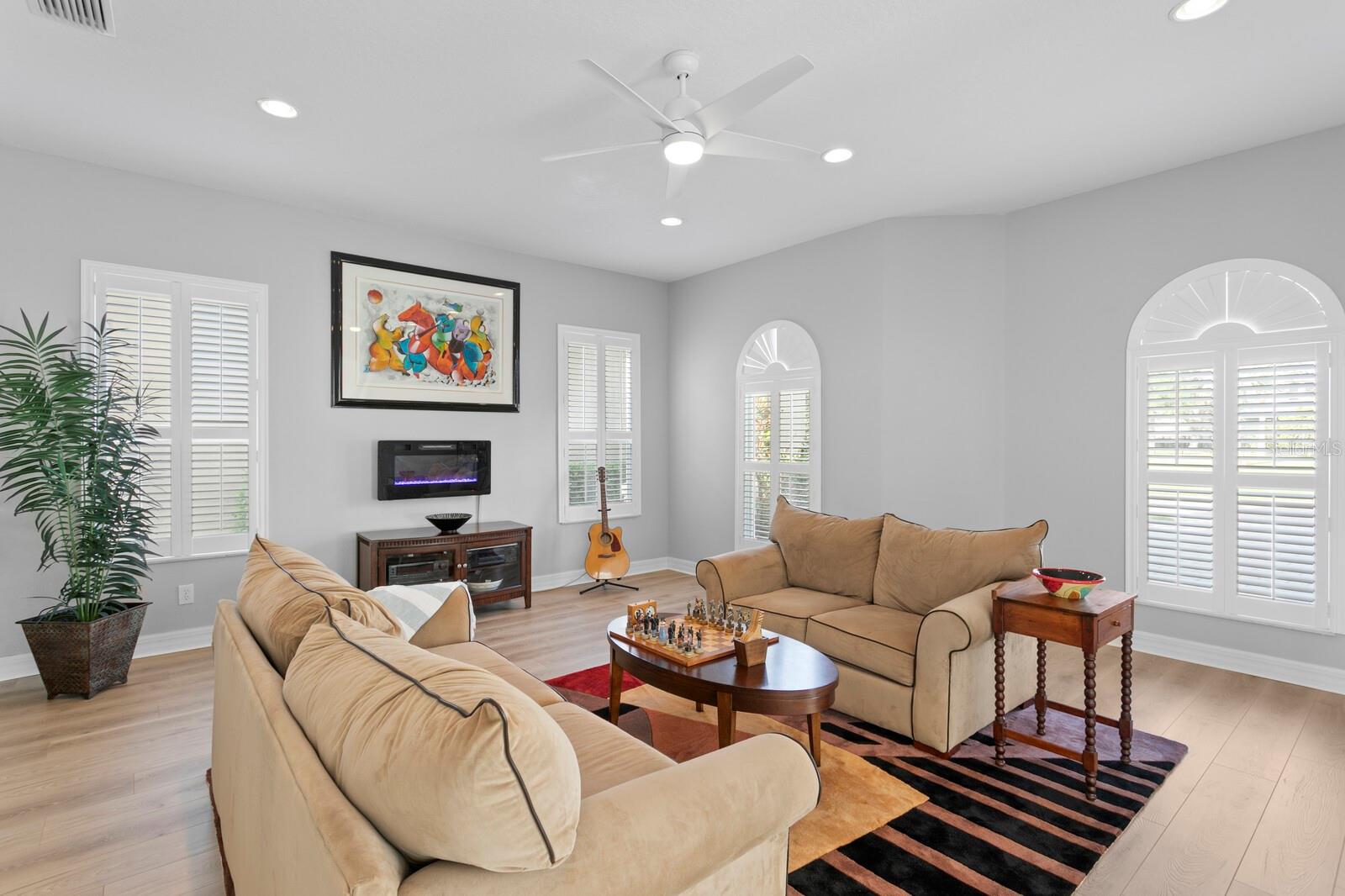 Formal living room with electric fireplace