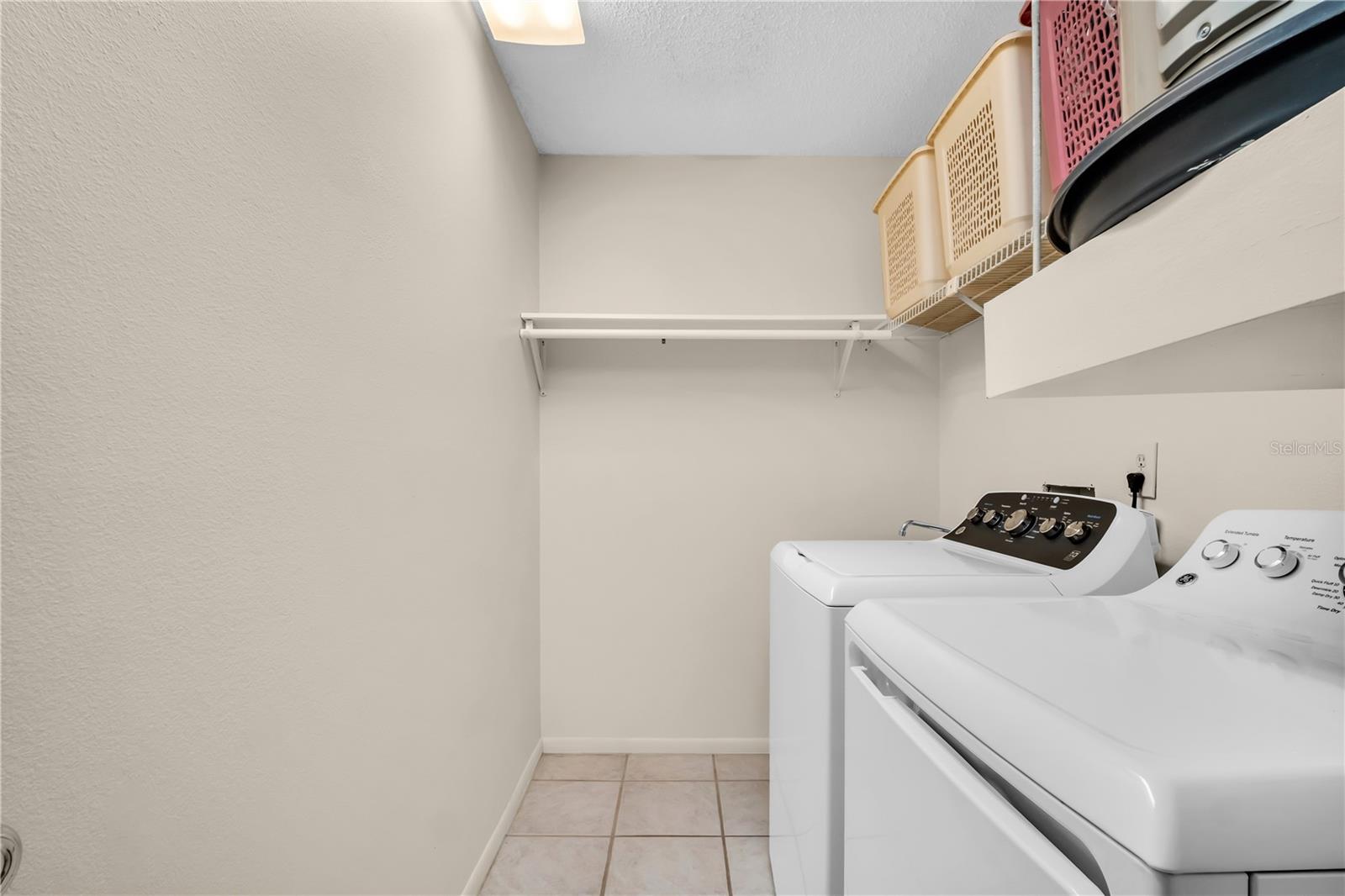 Large indoor laundry with convenient utility sink~