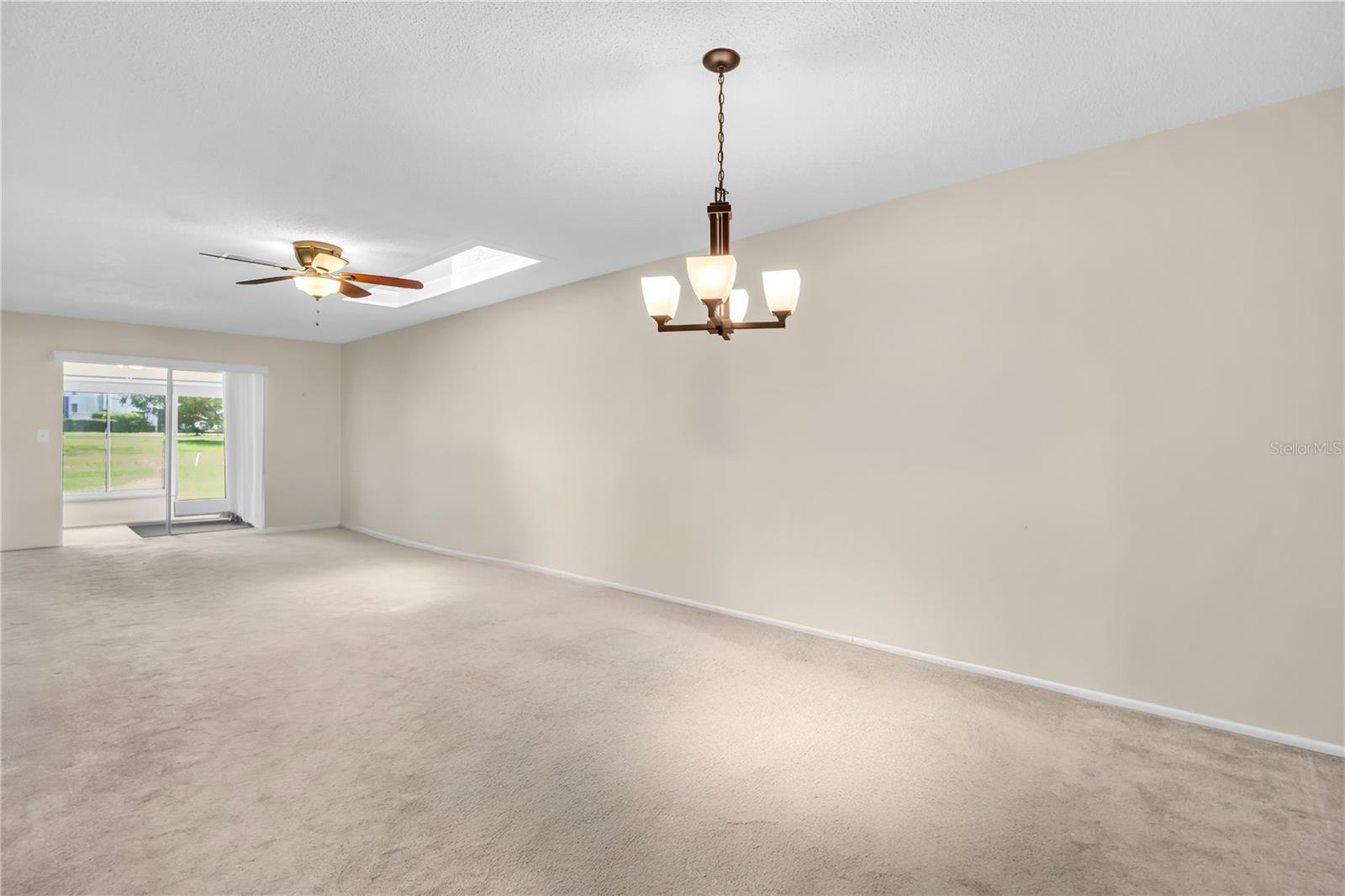 Light & bright main living with golf views~