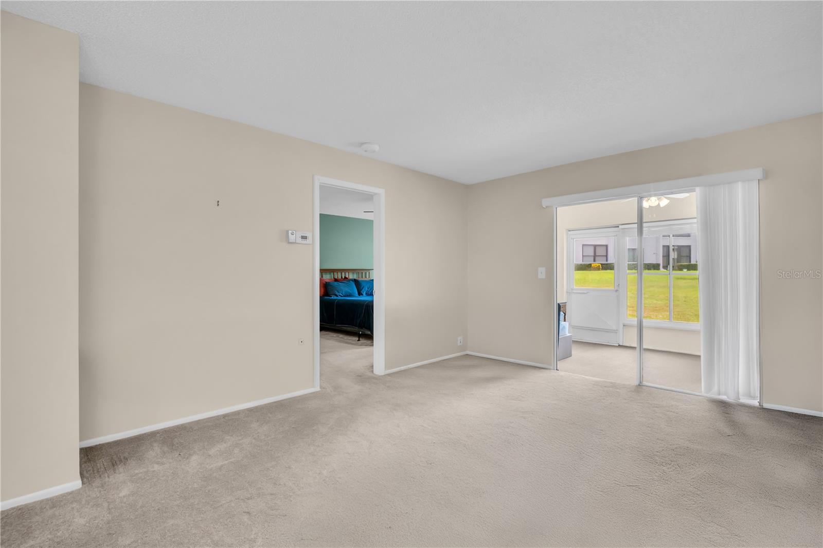 Master suite privately located at rear of home with peaceful green golf views~