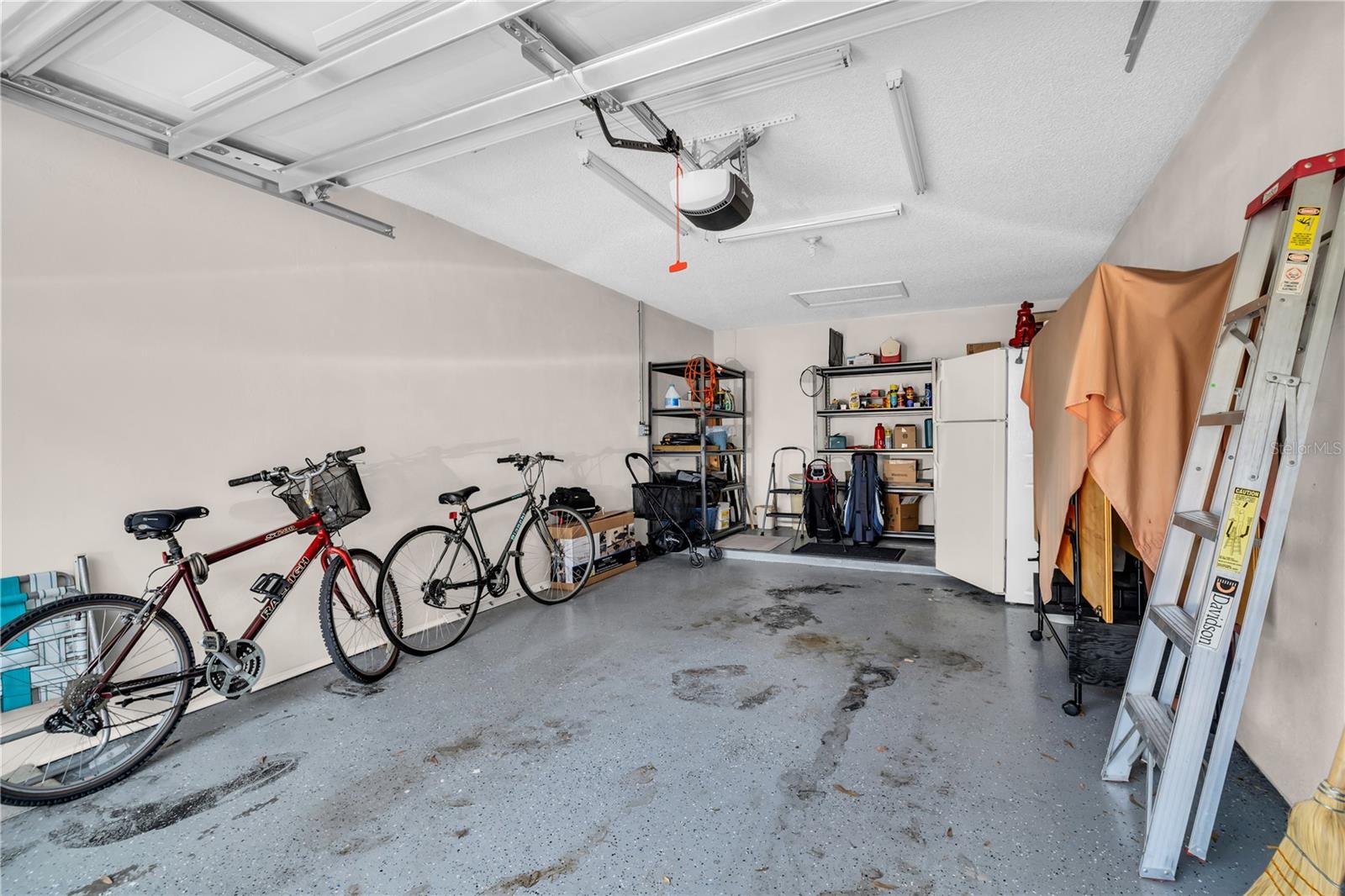 Oversized attached garage with the option to create door directly into your condo~