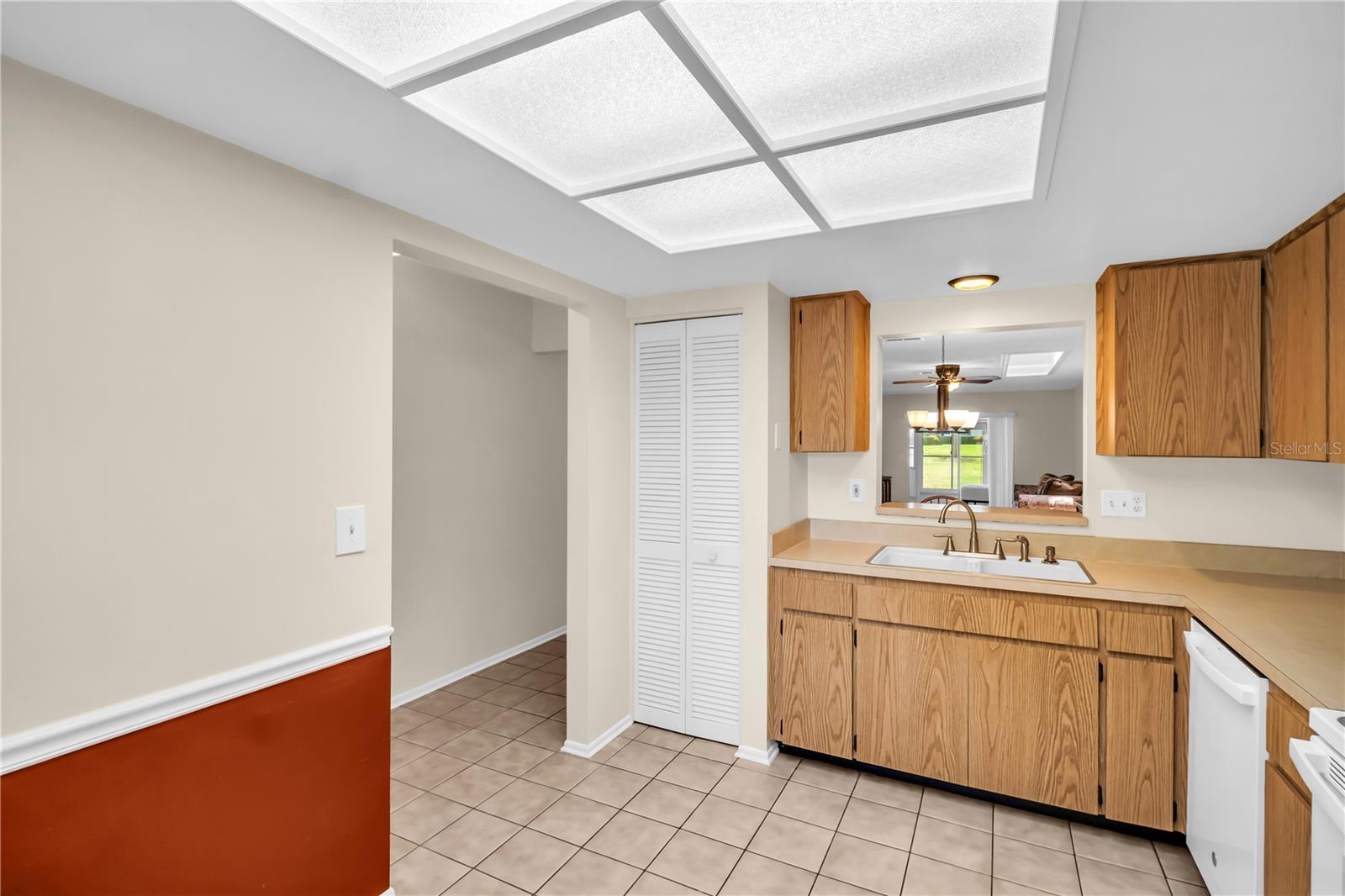 Pass-through window to main living & gracious pantry closet~