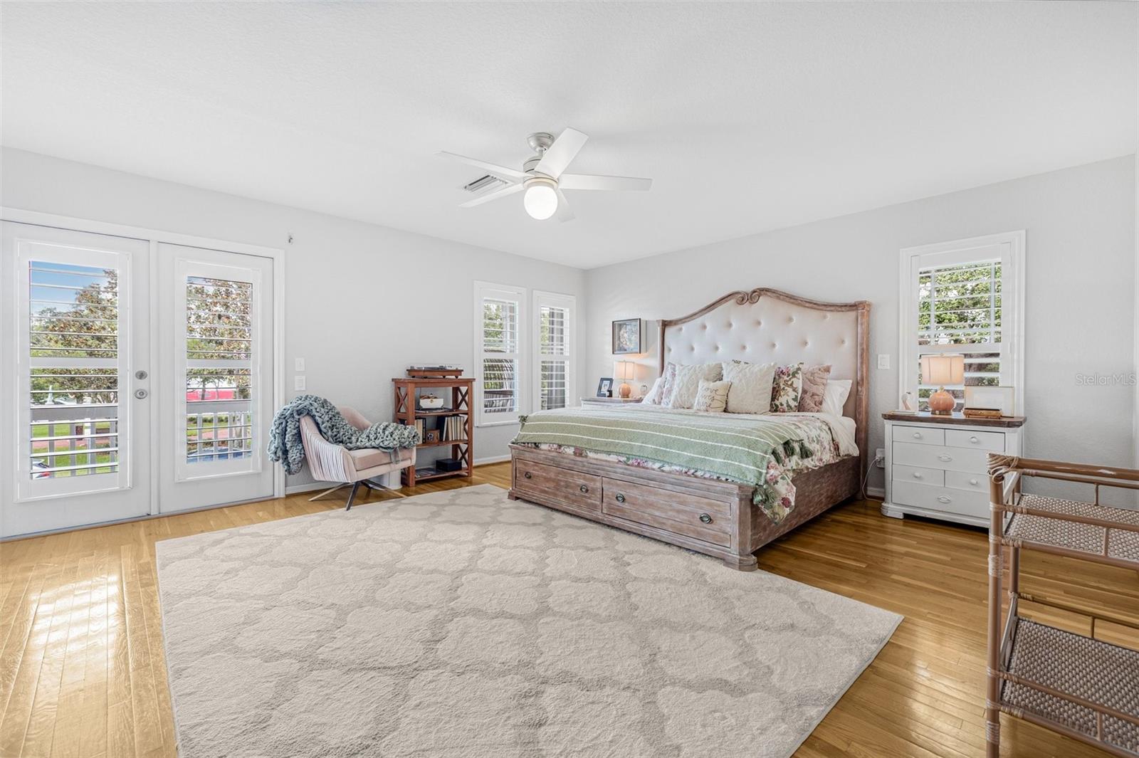 Primary Suite with french doors that lead to balcony.