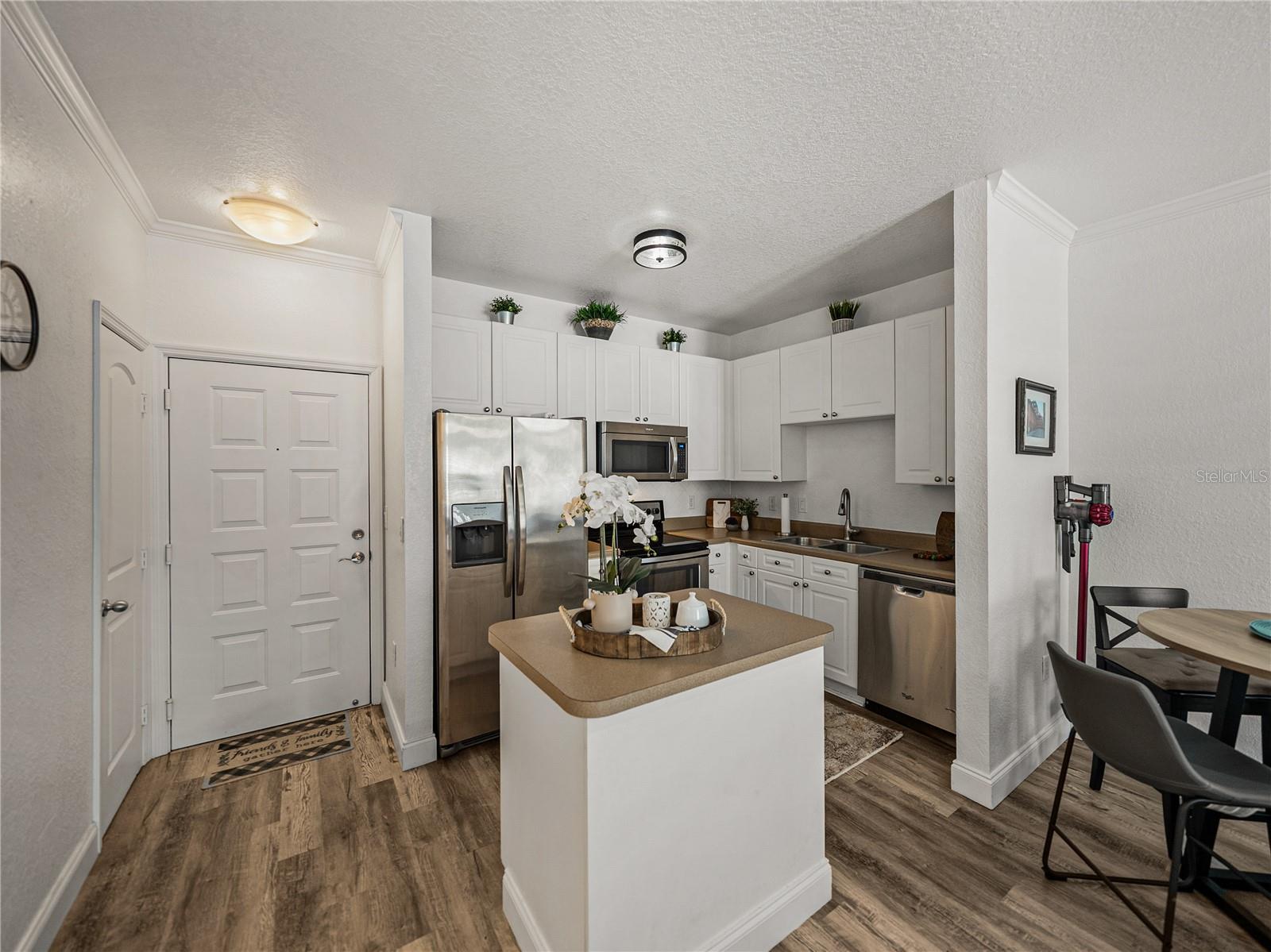 Kitchen open to Living and Dining Rooms
