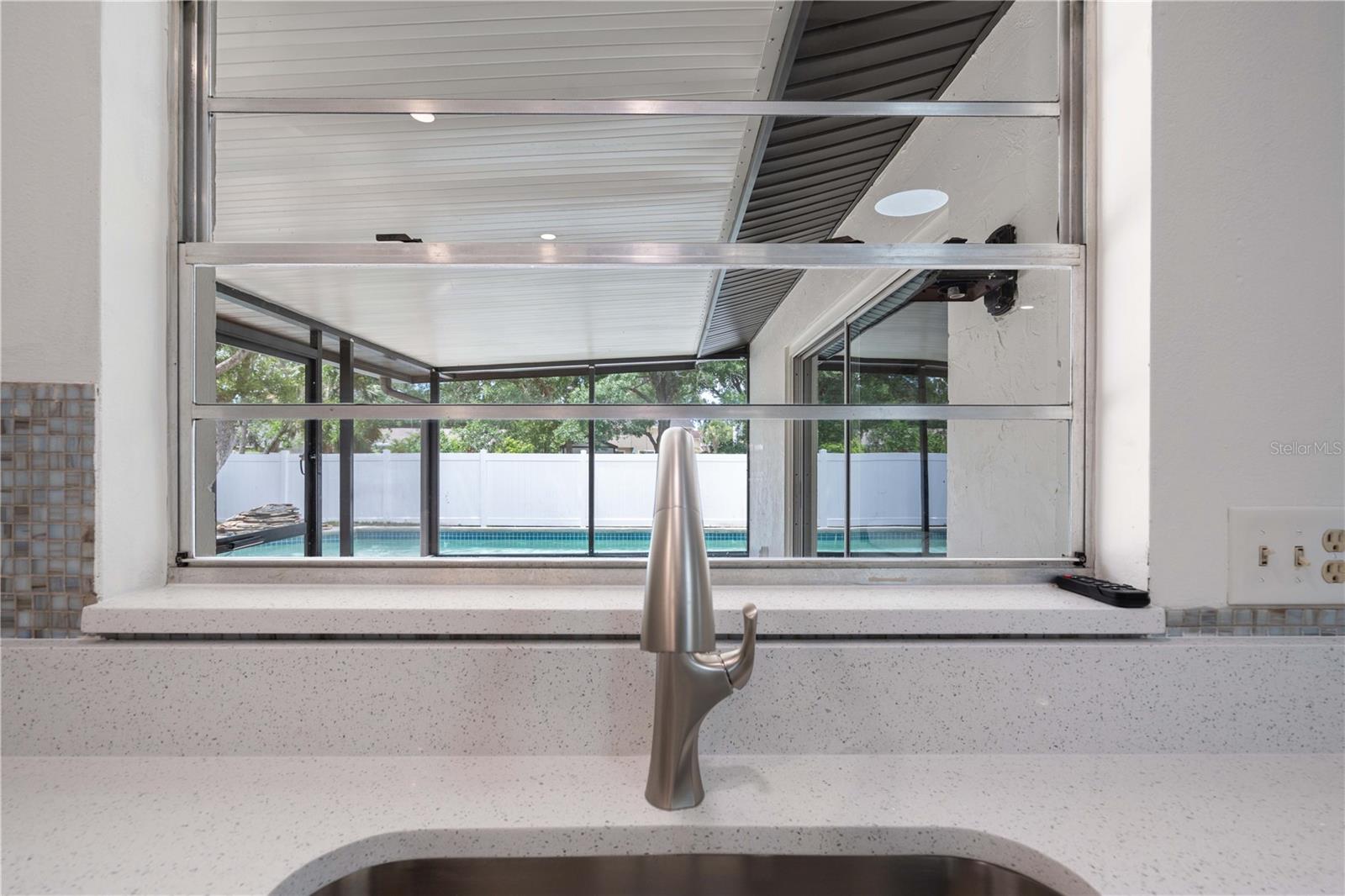 Pass through window..Serving Lanai w/ Pool Views