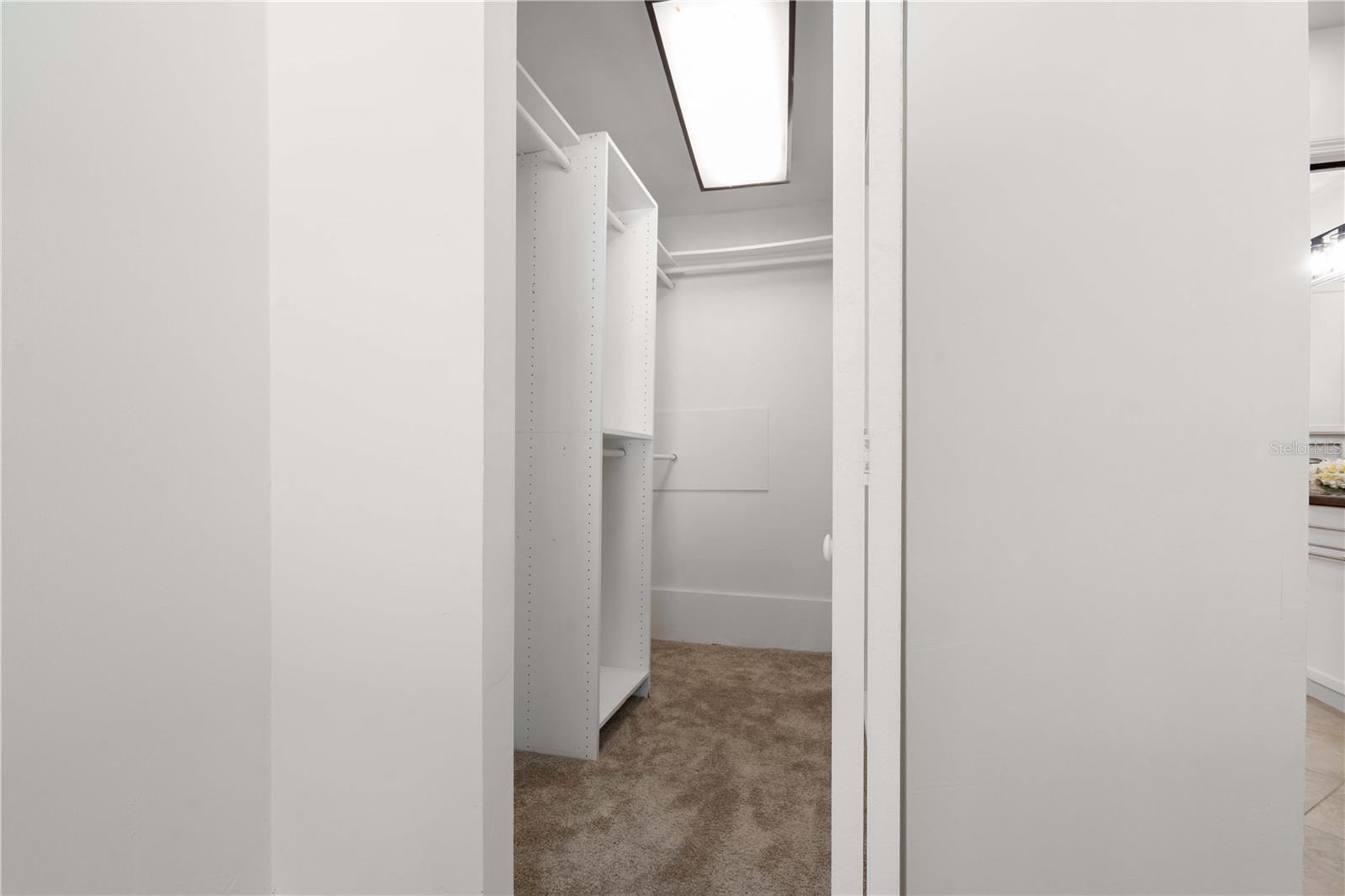 Primary Bedroom Walk-In Closet Built Out