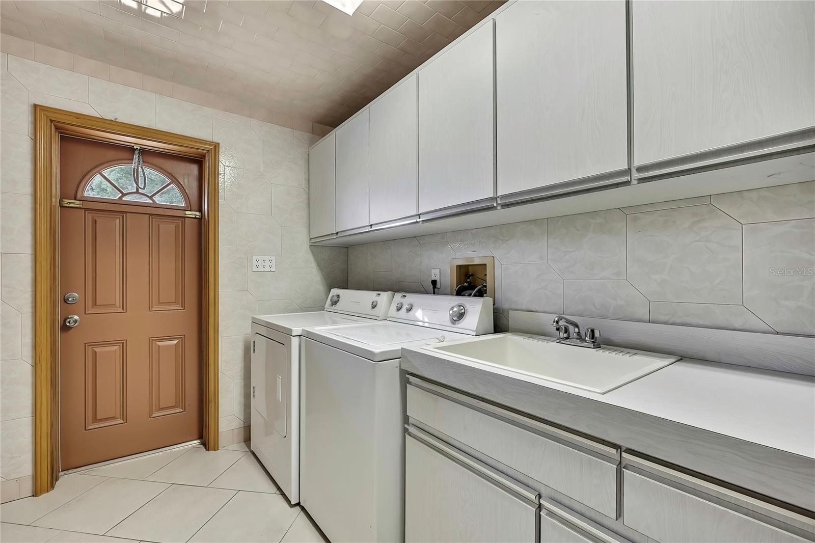 Huge utility room.  Exterior door entry