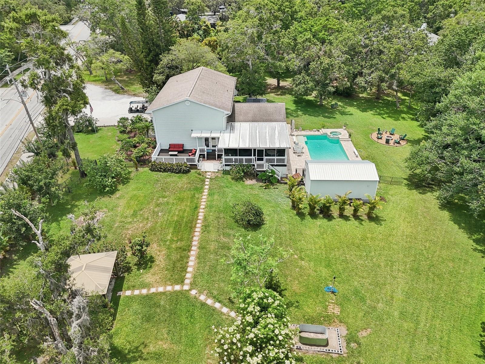 Gazebo overlooks the lush yard, garden, and serene preserve. Thinking you want chickens? There's plenty of space to create your own backyard homestead!  Zoning allows 3 chickens per lot!