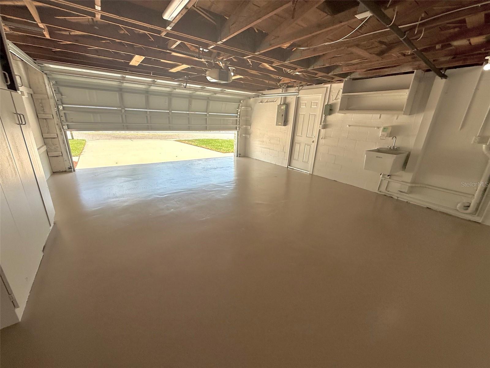 Large 2 car Garage with Brand New Garage Door