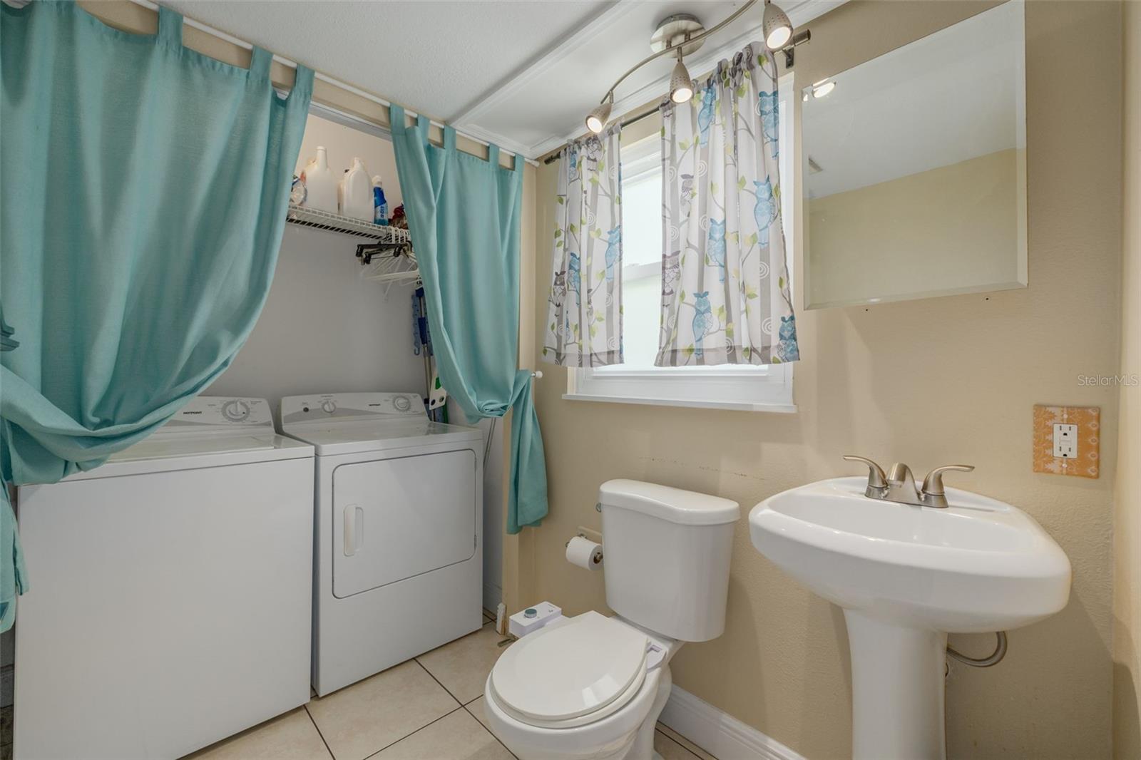 2nd level guest bath with laundry closet