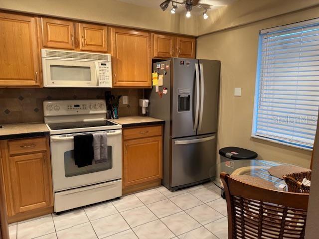 Kitchen is at front of Condo