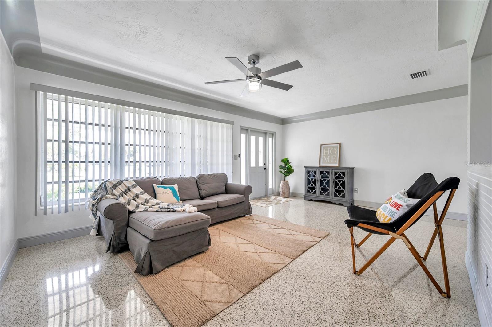 Can't miss the polished terrazzo floors and the cove ceilings.