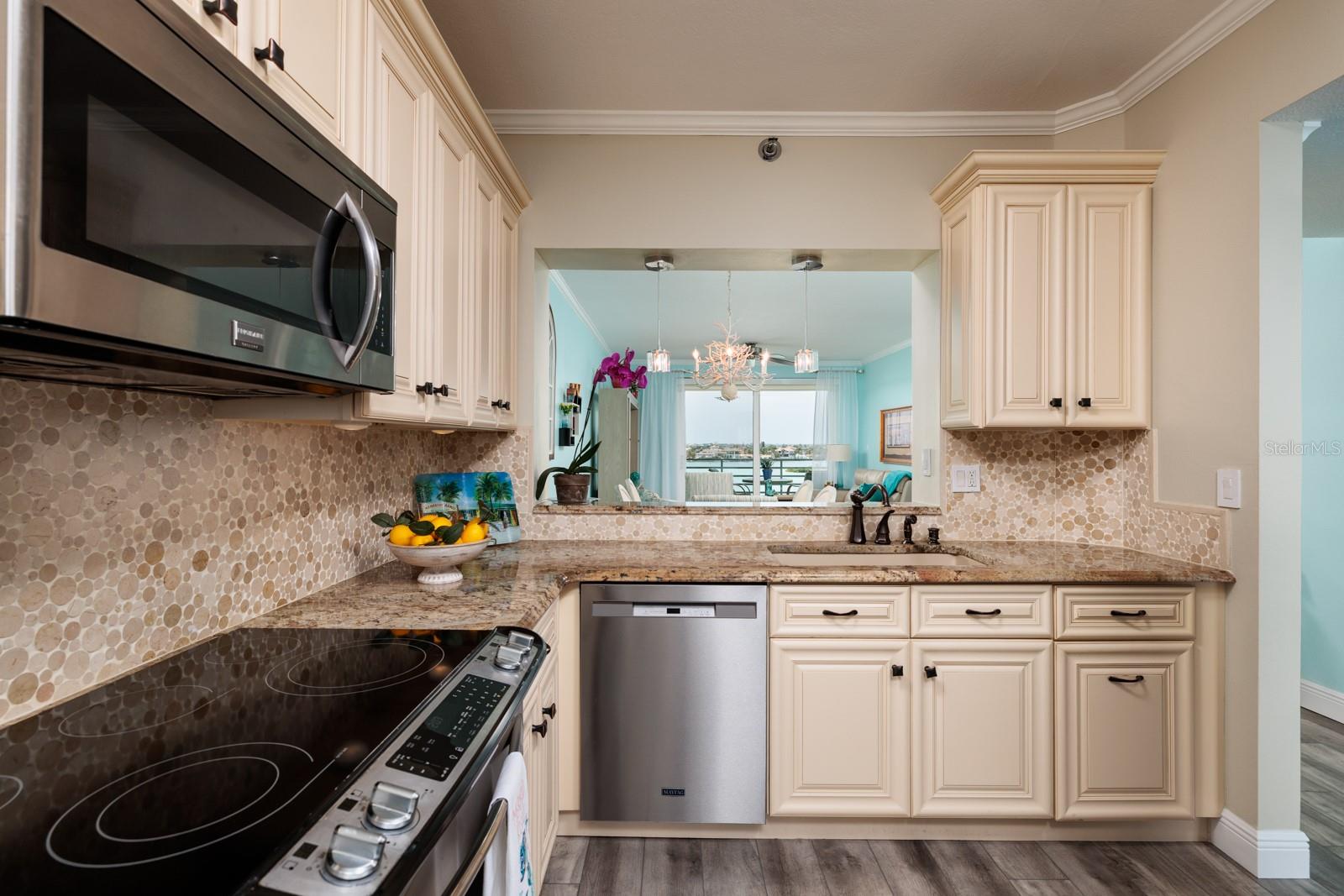 Granite counters and open view for the chef!