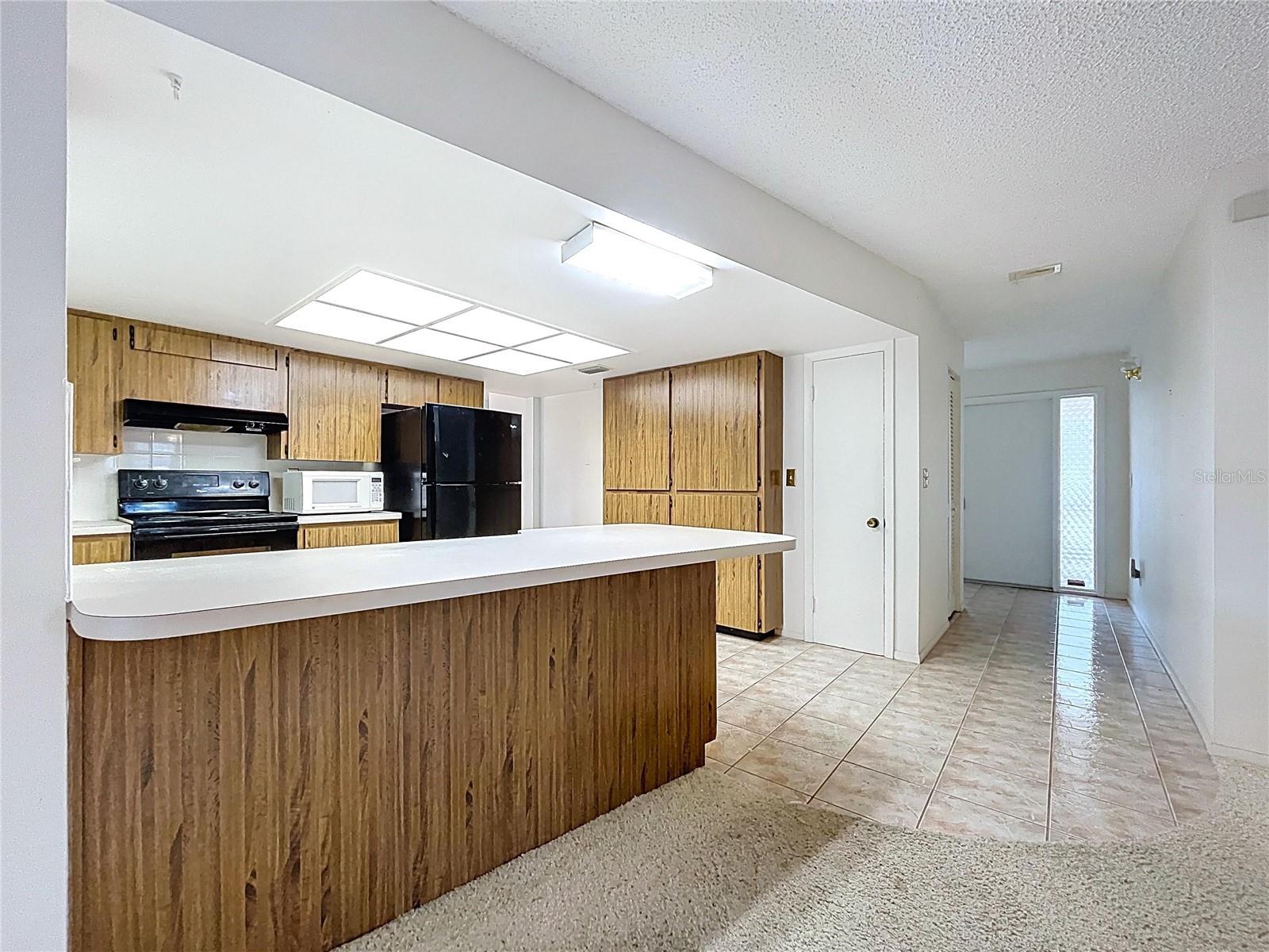 Kitchen opens up onto the Family room for easy entertaining with friends and family.