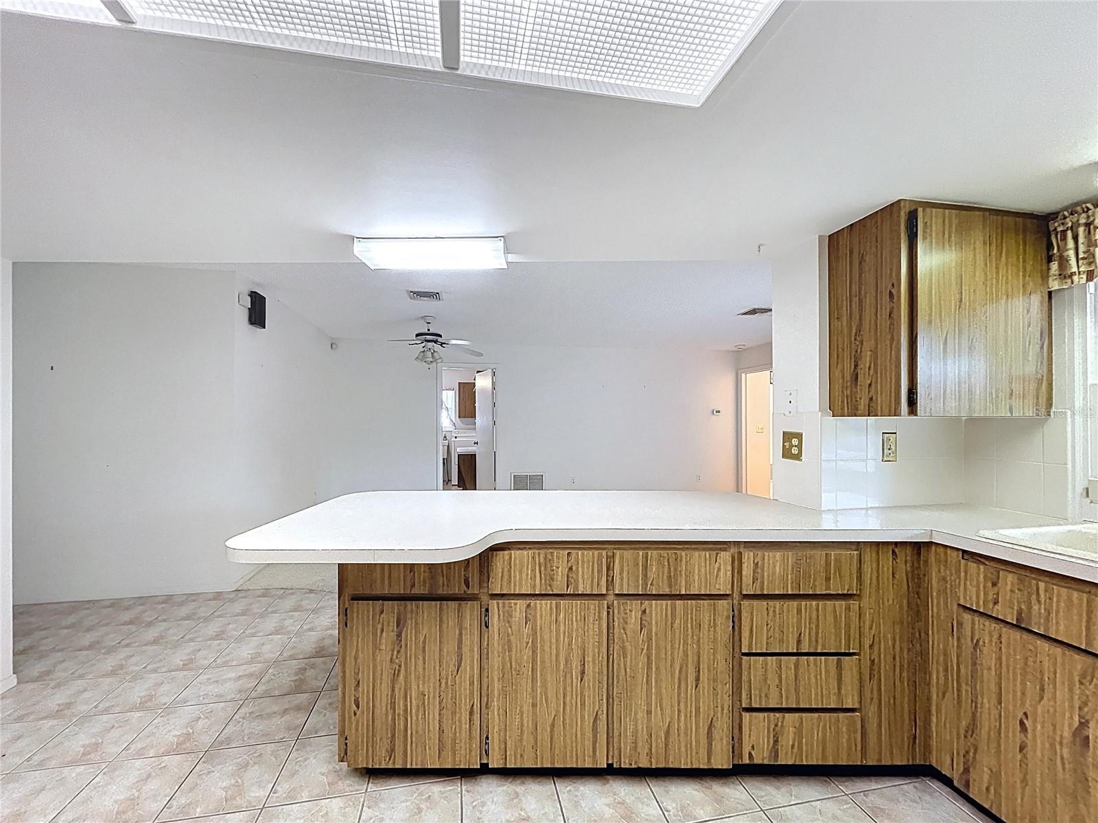 Kitchen offers a closet pantry and plenty of cabinet space.