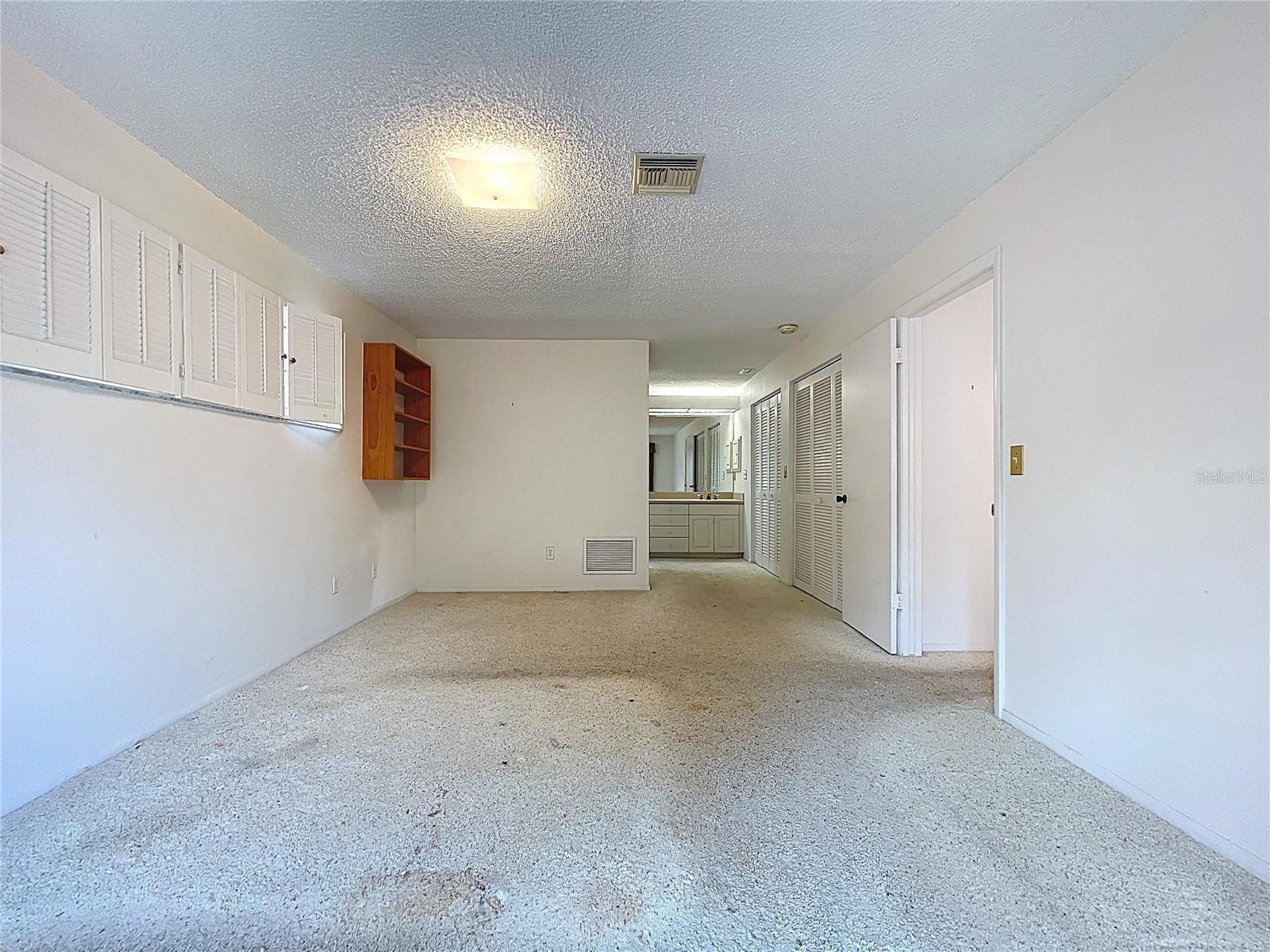 Ample natural light through double pane windows and sliding glass door.
