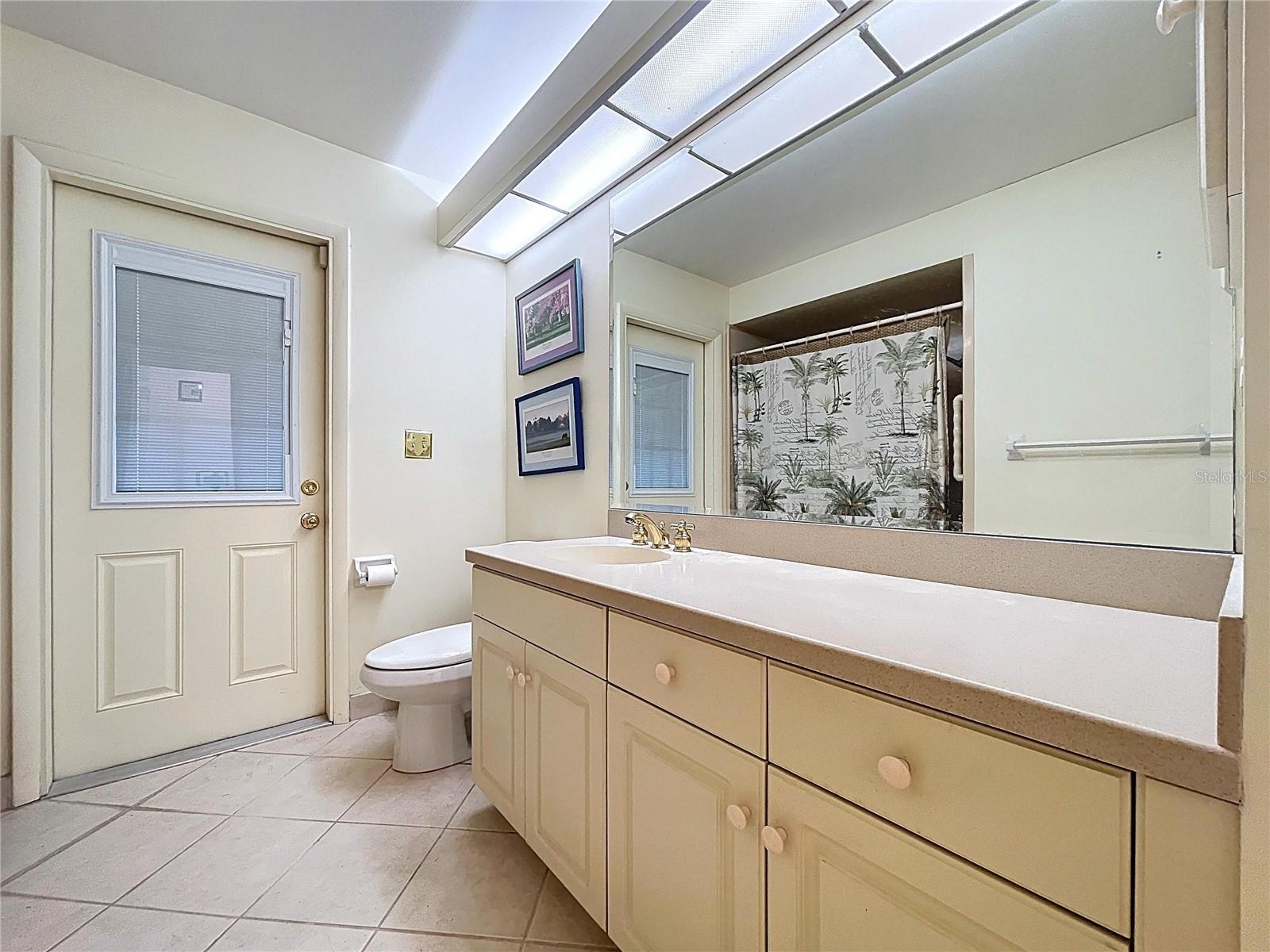 2nd bathroom offers access to rear patio and could be a pool bath when a pool is added.