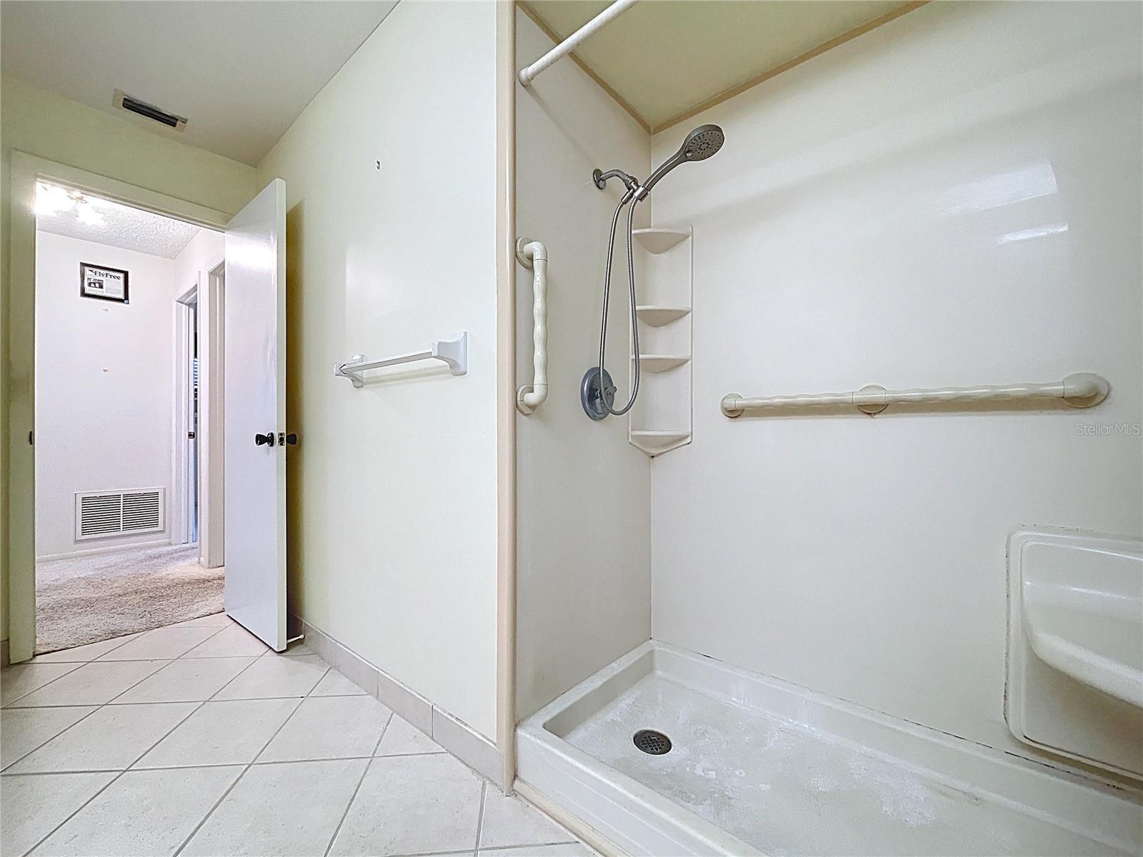 2nd bathroom offers access to rear patio and could be a pool bath when a pool is added.