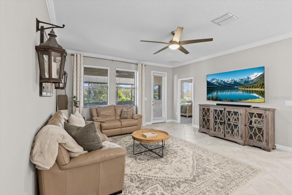Living room with access to primary suite