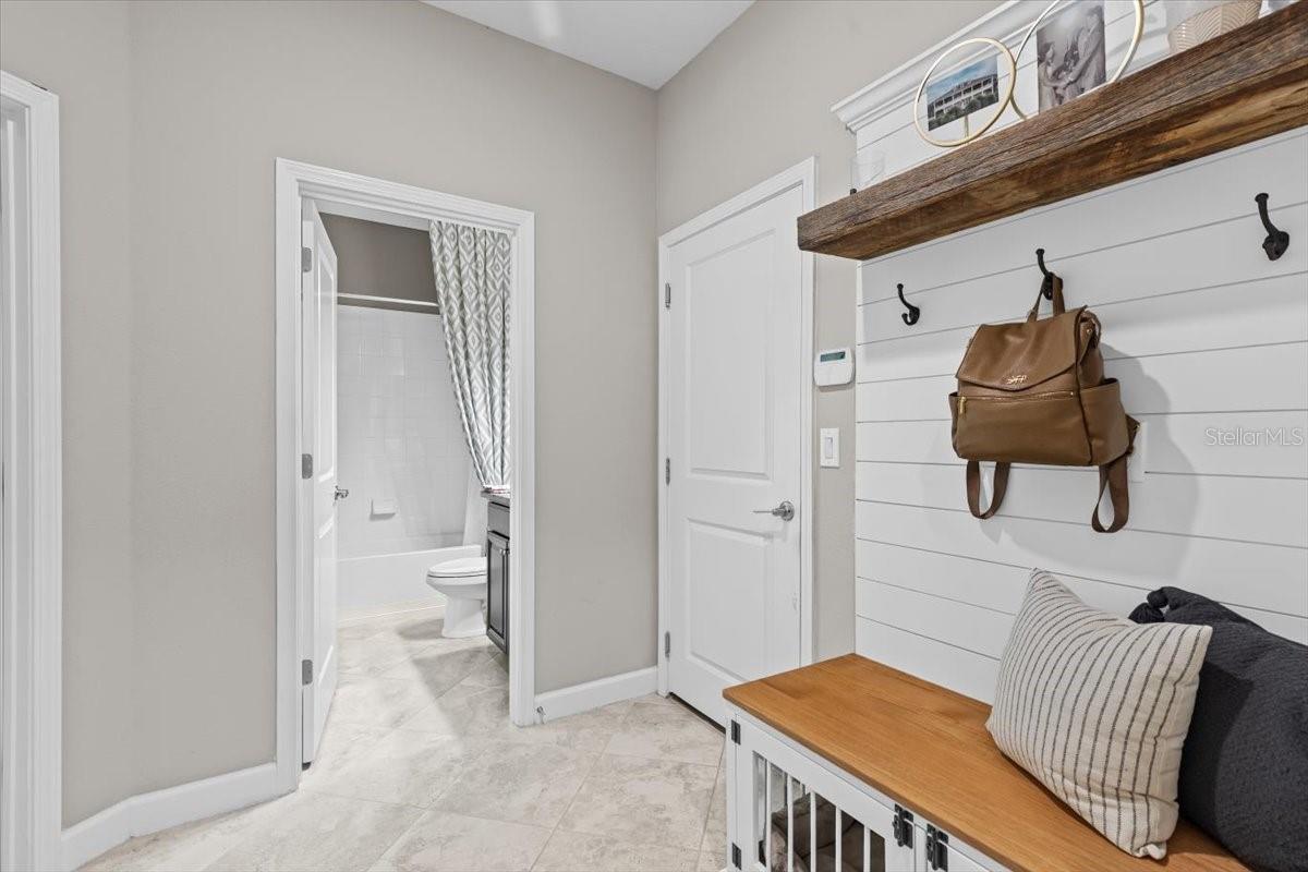 Entry from garage with drop zone and bath #2