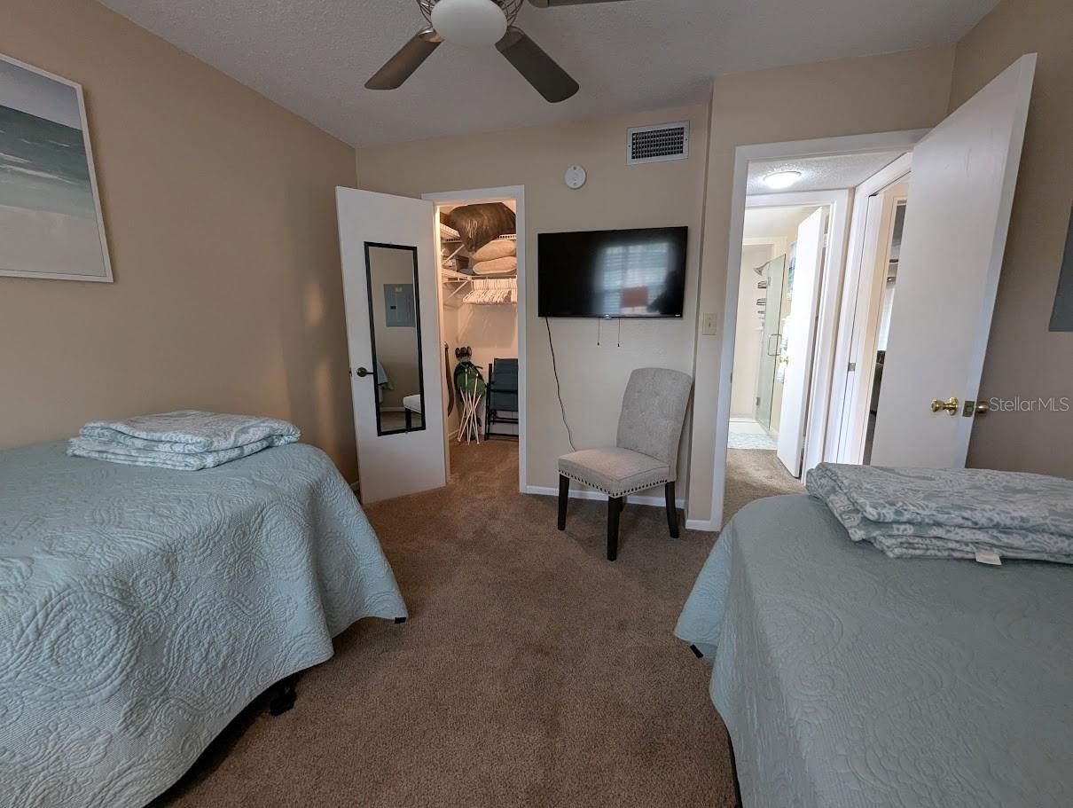 Second bedroom with walkin closet and access to second bath