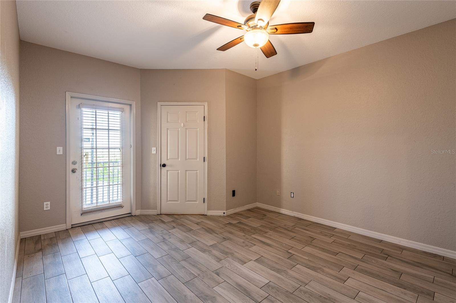 Primary Bedroom with balcony access